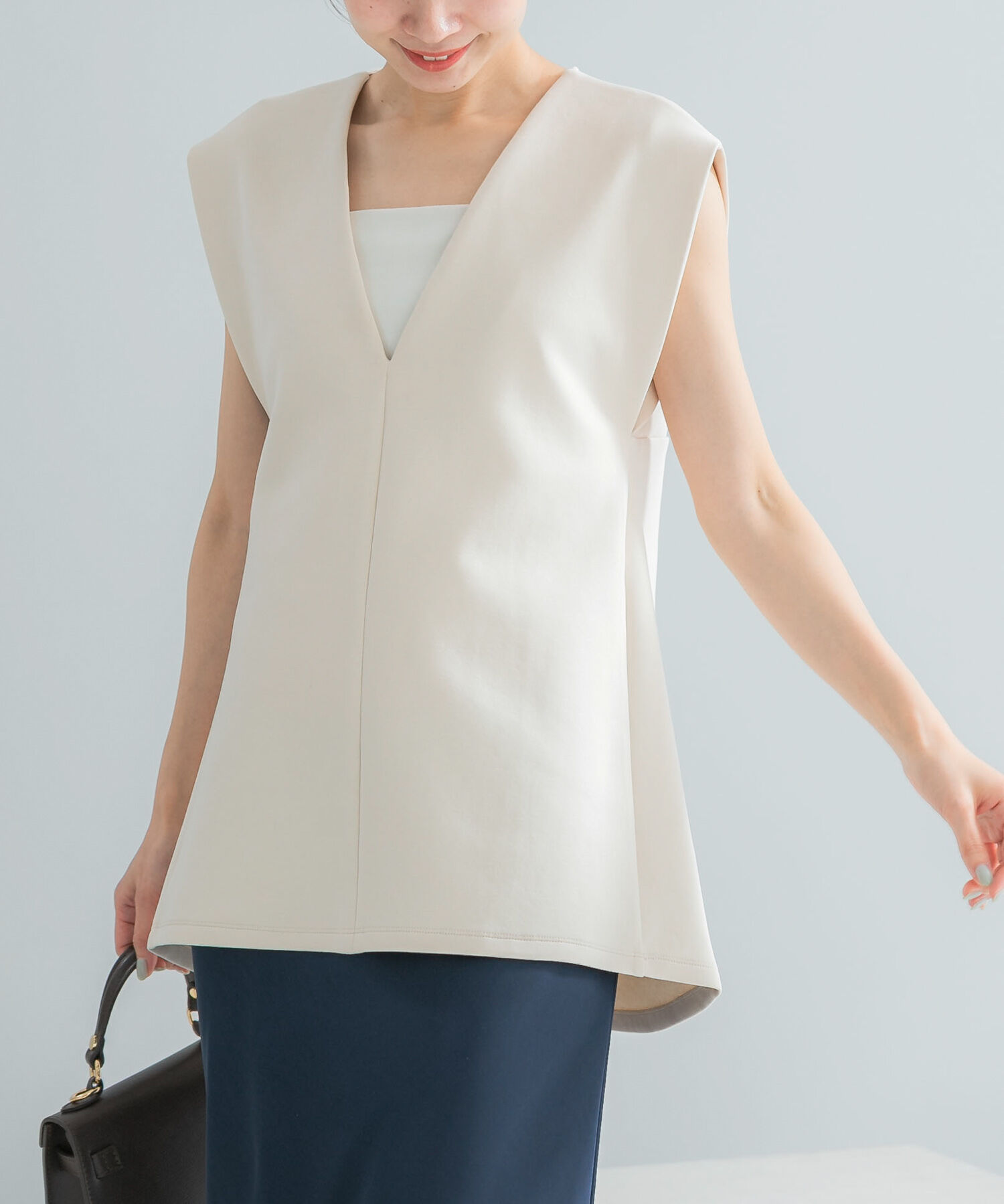 Vネックポンチベスト