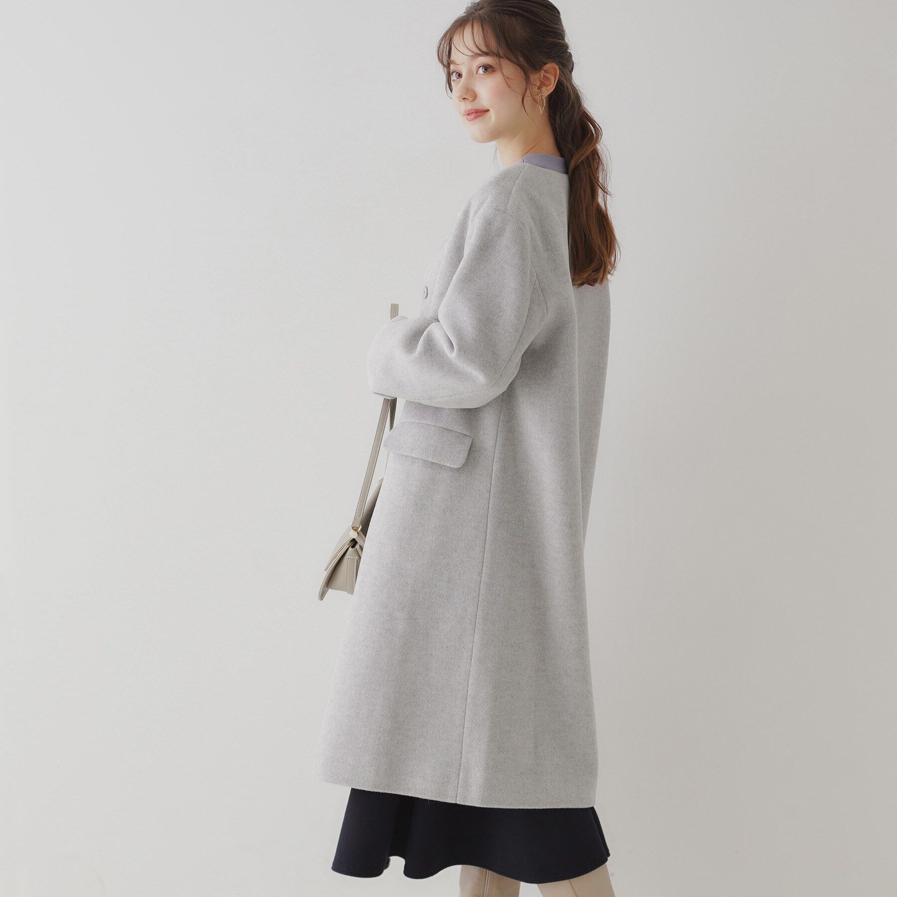 Couture broach「【プチプラ・華やかさを高める】ビジュー釦ロングコート」|ノーカラーコート|