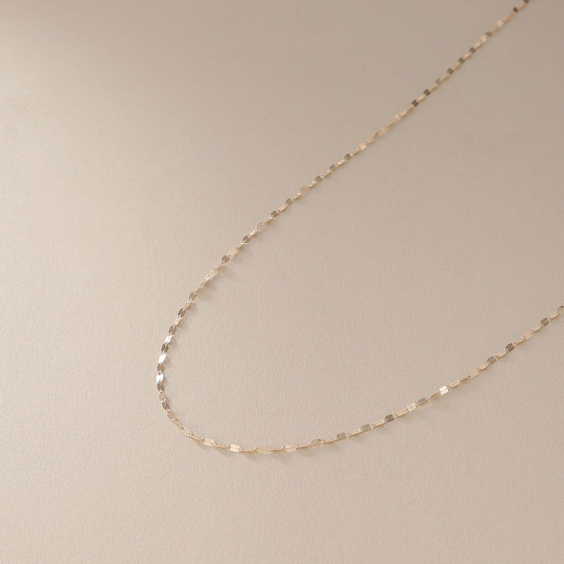 COCOSHNIK「K10フラワークロス（ロング） ネックレス」|ネックレス|