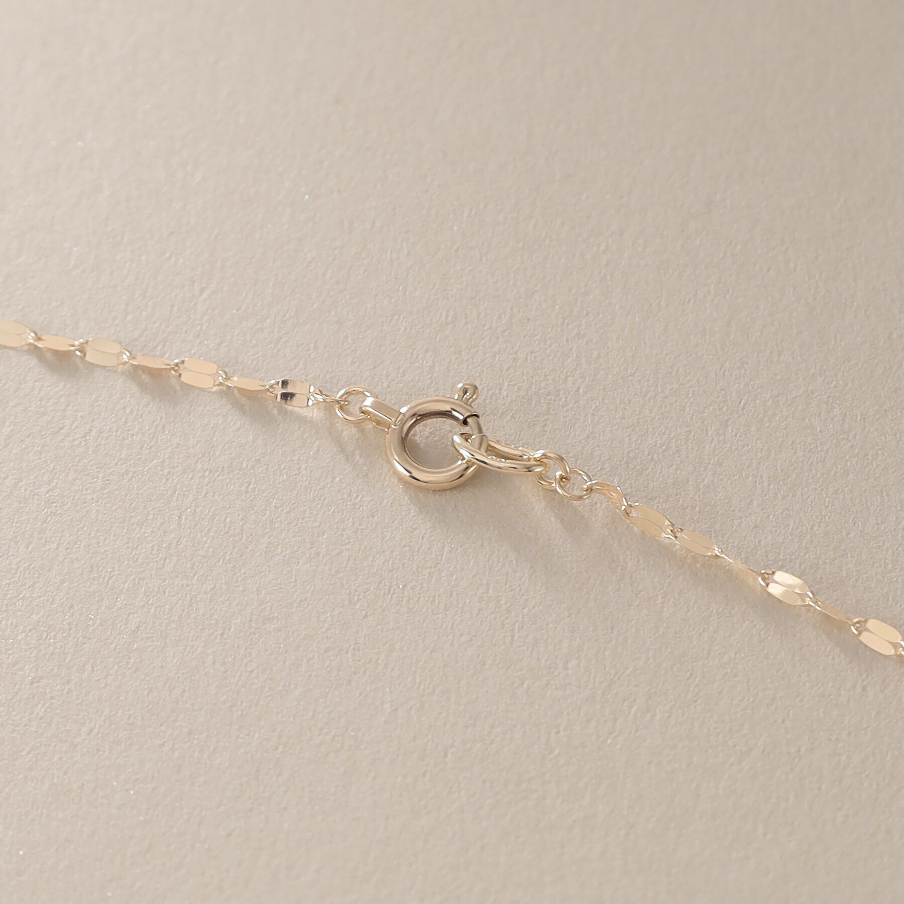 COCOSHNIK「K10フラワークロス（ロング） ネックレス」|ネックレス|