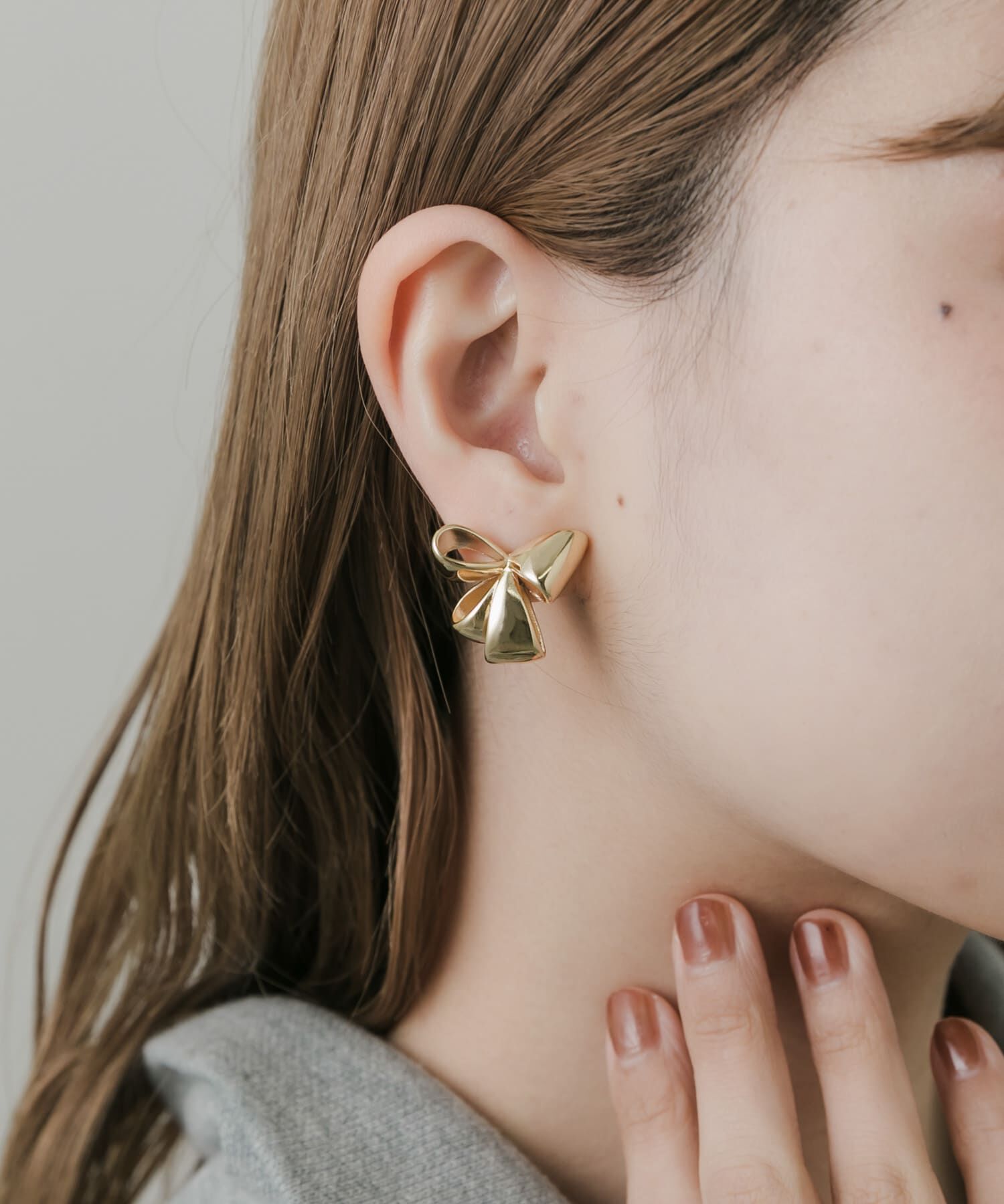 SMELLY「ニュアンスリボンモチーフイヤリング」|イヤリング|