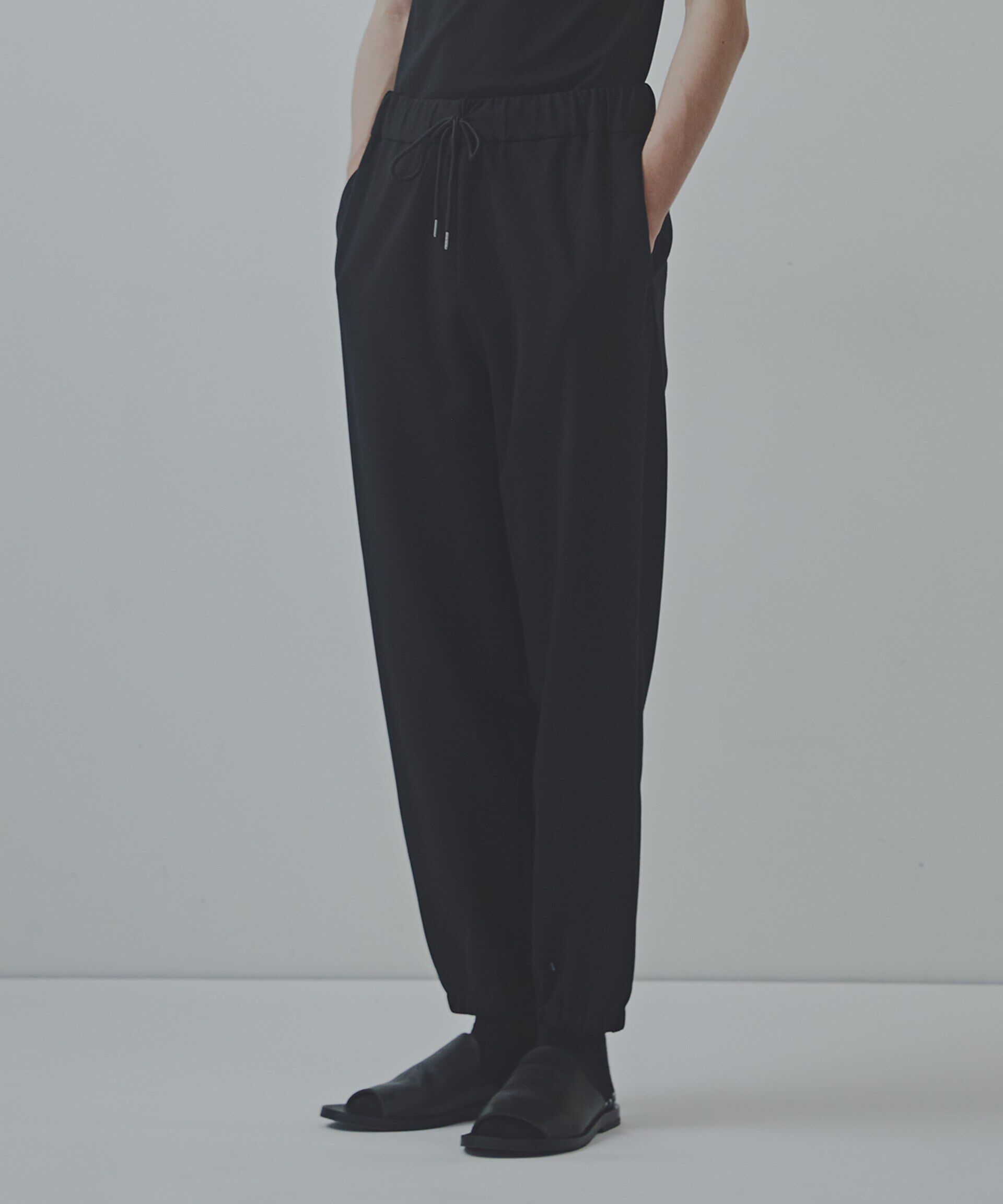 nano･universe「｢Commonuse｣ウィークエンドイージーパンツ」|チノ|ブラック