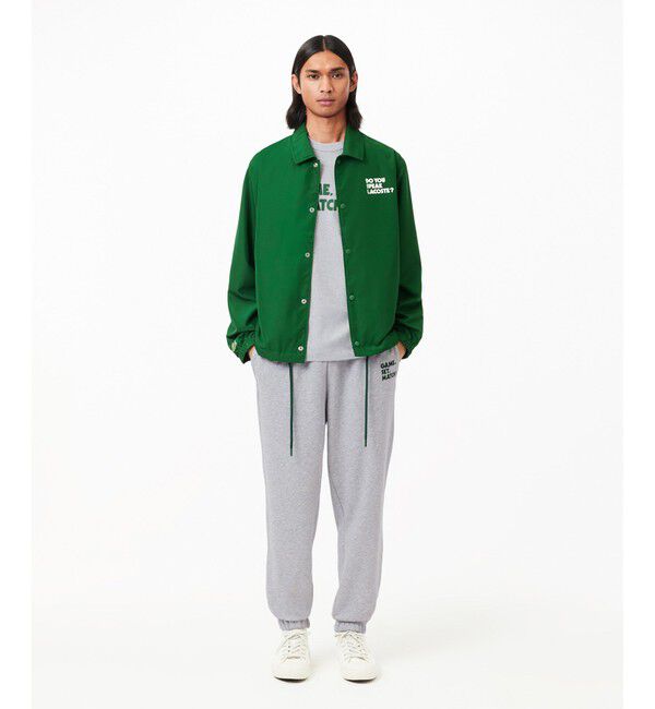 LACOSTE「オーガニックコットン メッセージプリントバインダーネック半袖Tシャツ」|Tシャツ・カットソー|