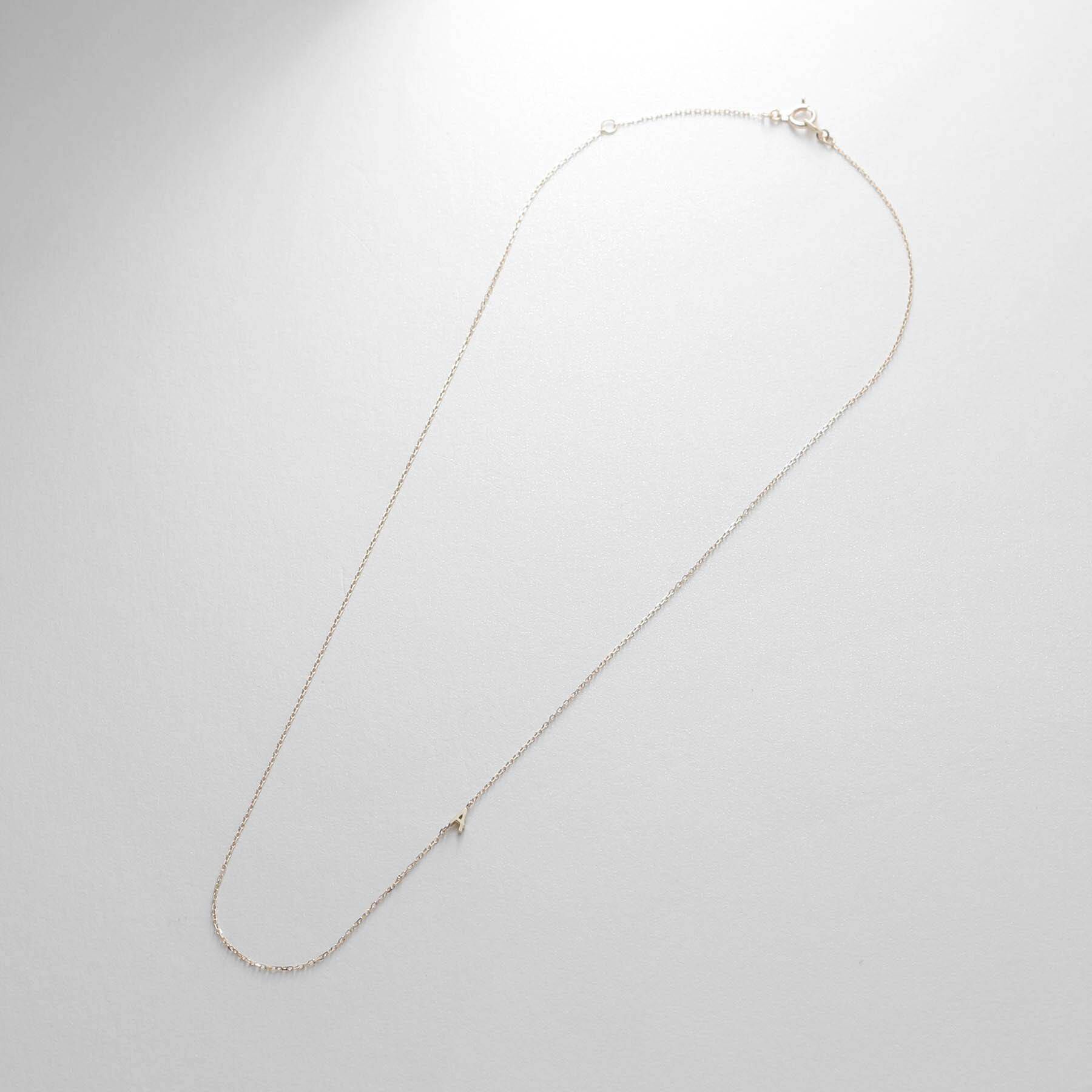 COCOSHNIK「【WEB限定】K10イニシャルＡ ネックレス」|ネックレス|