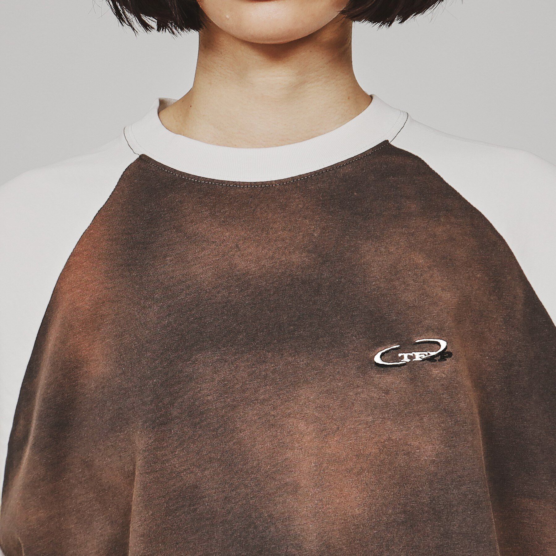 tk.TAKEO KIKUCHI「ブリーチラグランスリーブTシャツ」|Tシャツ・カットソー|