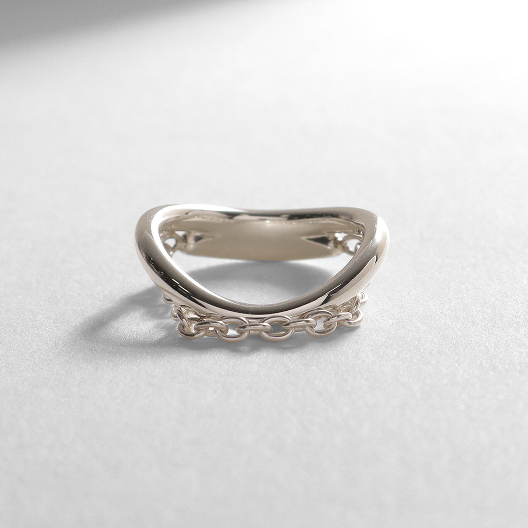 COCOSHNIK ONKITSCH「シルバー ドレープチェーン カーブリング」|リング|