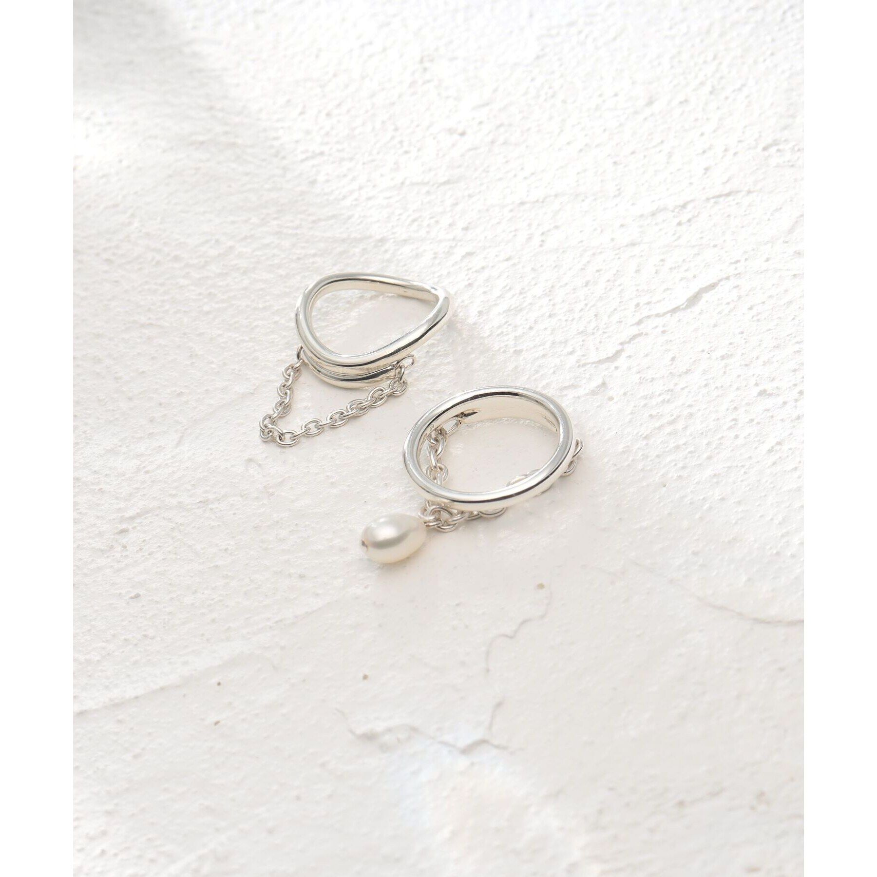 COCOSHNIK ONKITSCH「シルバー ドレープチェーン カーブリング」|リング|