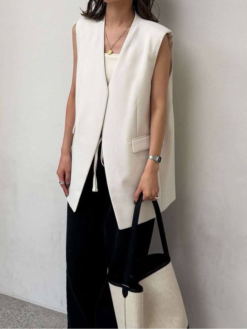 Mila Owen「ソリッドノーカラーロングベスト」|ダウンベスト・ベスト|IVR