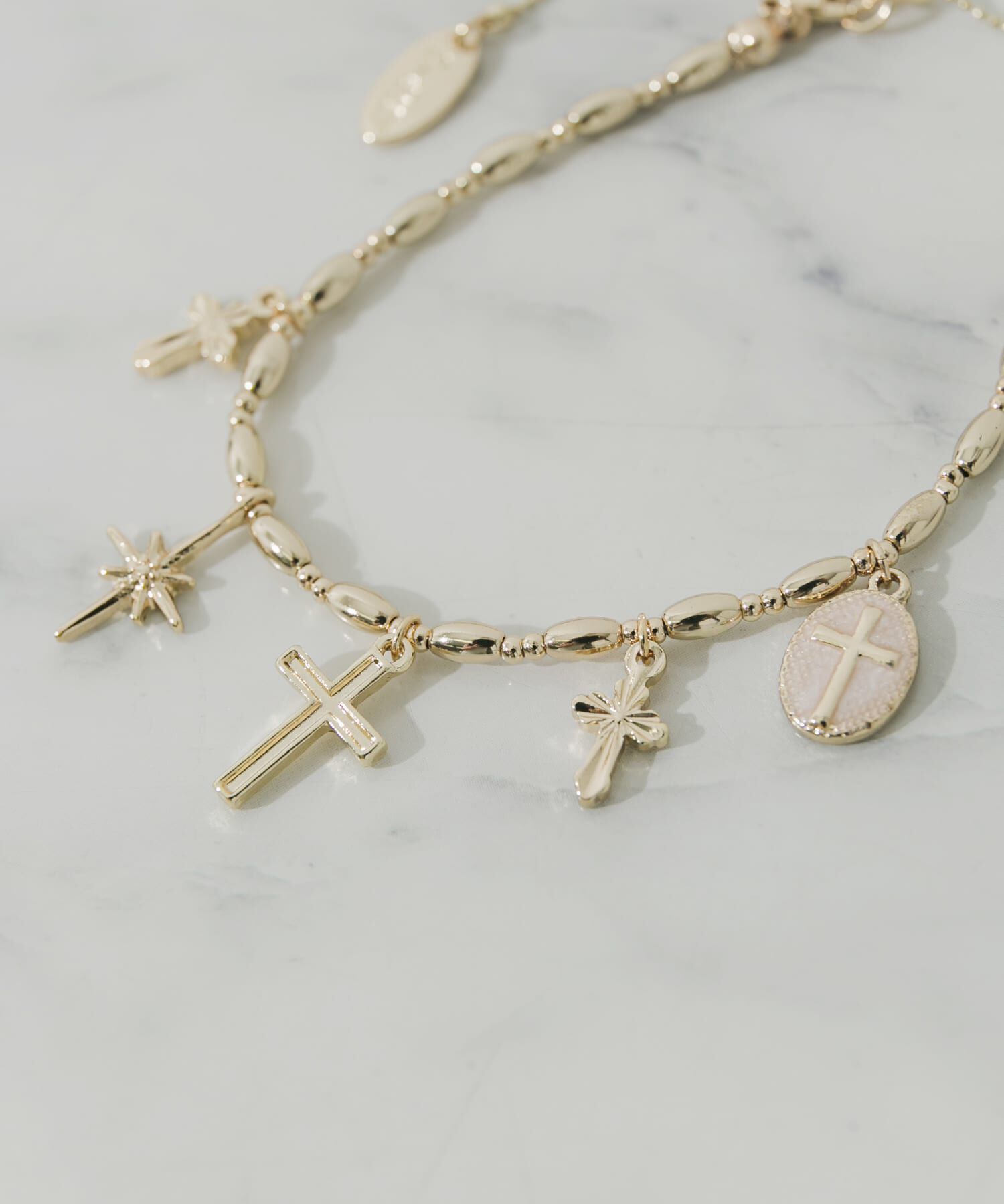 SMELLY「クロスチャームブレスレット」|ブレスレット・バングル|