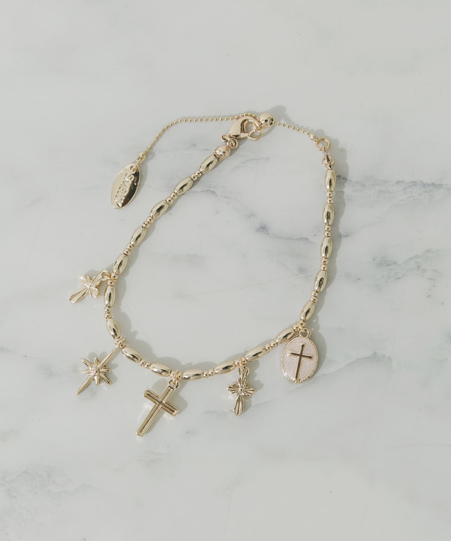 SMELLY「クロスチャームブレスレット」|ブレスレット・バングル|