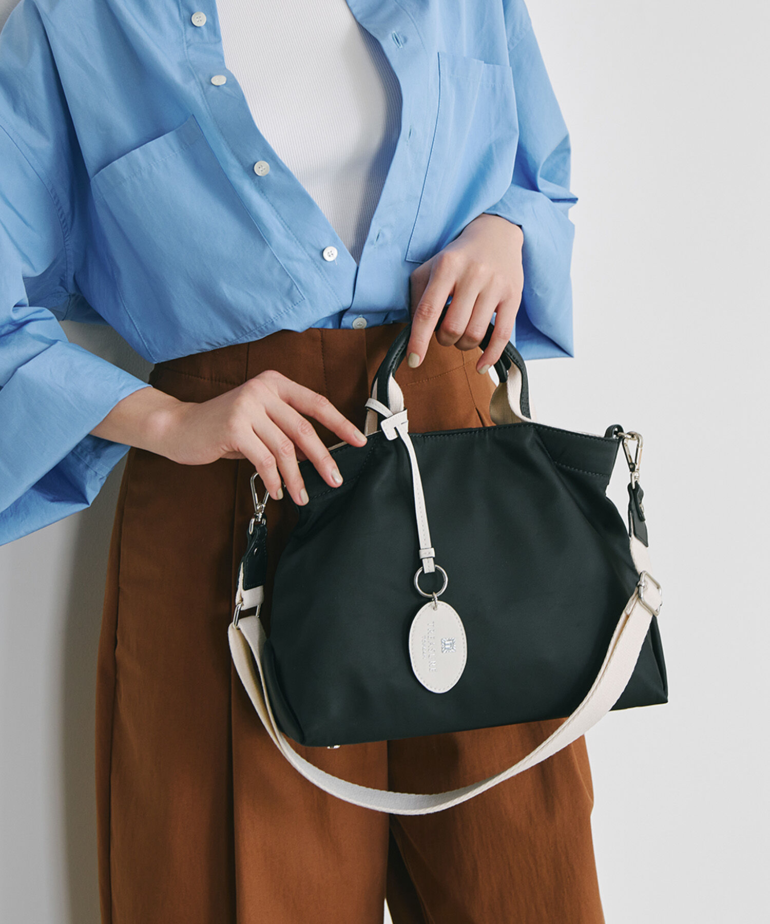 TOPKAPI BREATH「【TREASURE TOPKAPI】ストライプハンドル ナイロン 2way ミニ トートバッグ」|ショルダー・メッセンジャー|ブラック