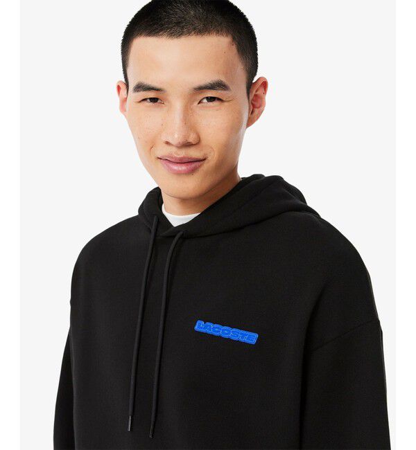 LACOSTE「グラフィックバックプリントスウェットフーディー / 裏パイルスウェットパーカー」|パーカー|