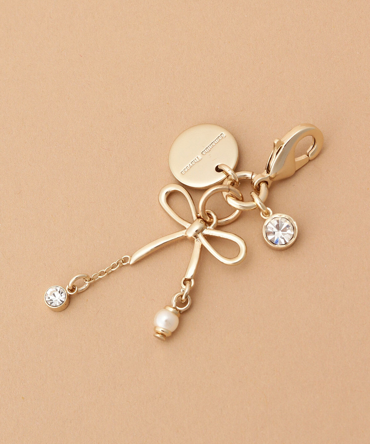 Samantha Thavasa「ゴールドリボンファスナーチャーム」|チャーム・キーホルダー|クリア