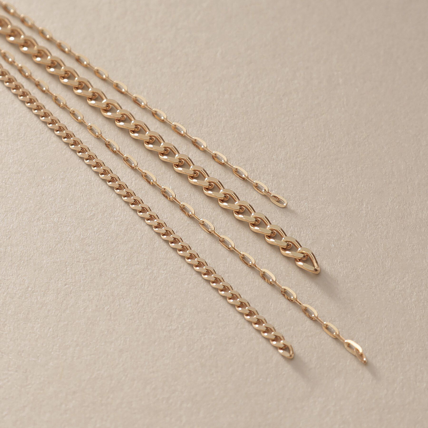 COCOSHNIK「K10キヘイミックスチェーンフリンジ スタッドピアス」|ピアス|