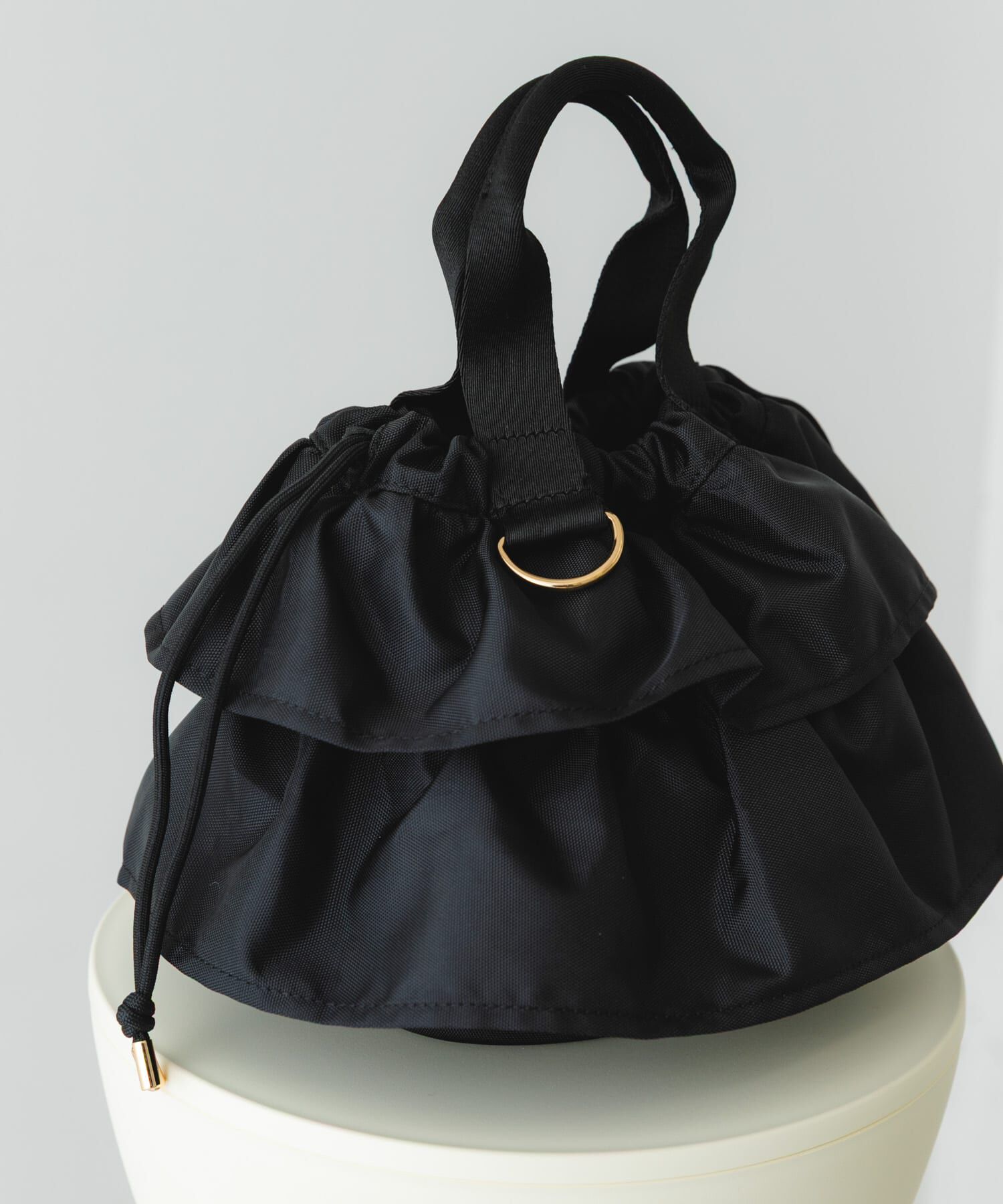 RODE SKO「軽量フリルキンチャクバッグ」|ハンドバッグ|