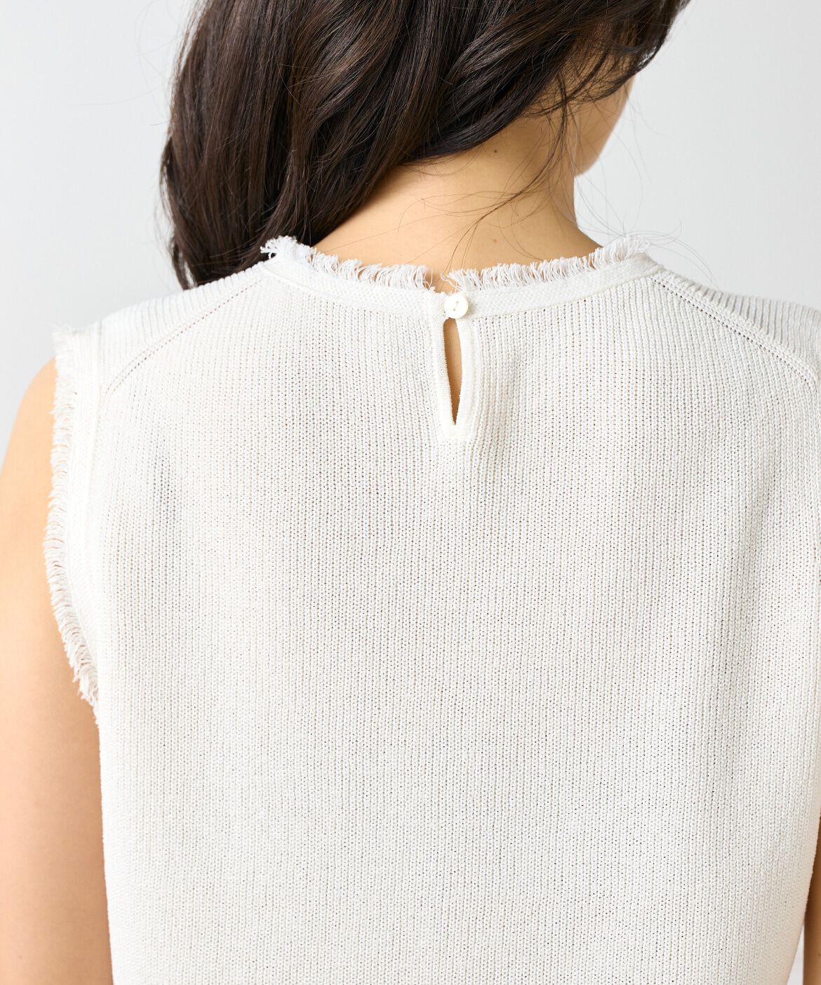 INED「ミニフリンジ付きノースリブニット」|ニット・セーター|
