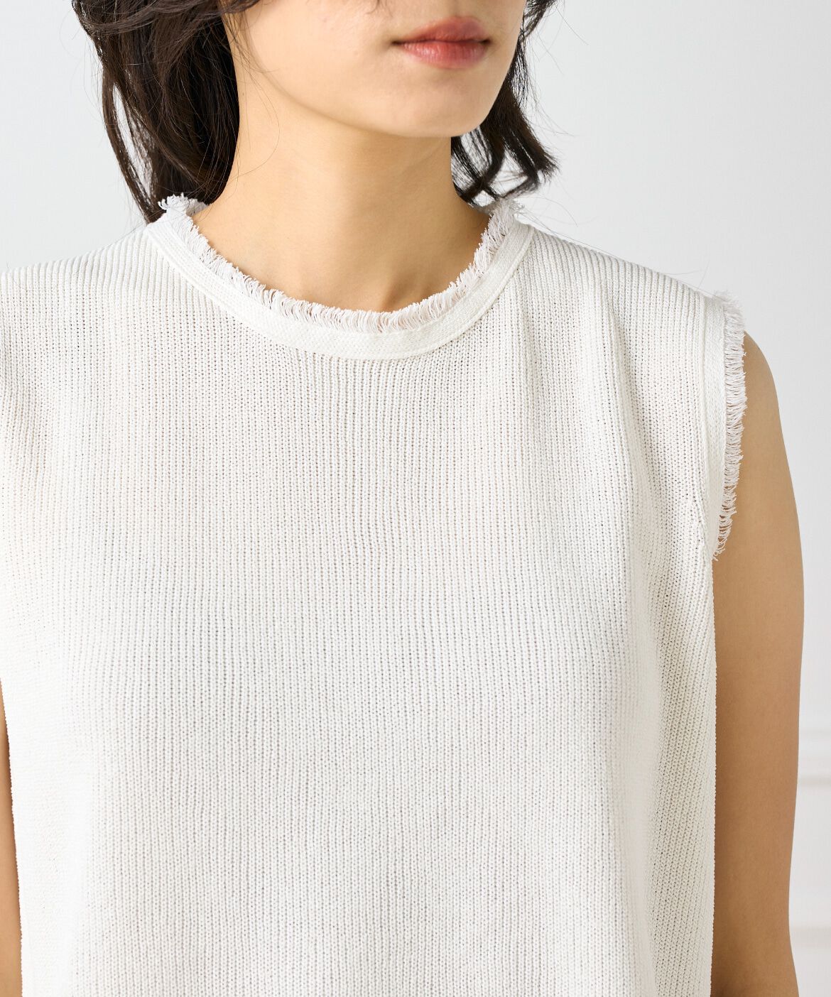 INED「ミニフリンジ付きノースリブニット」|ニット・セーター|