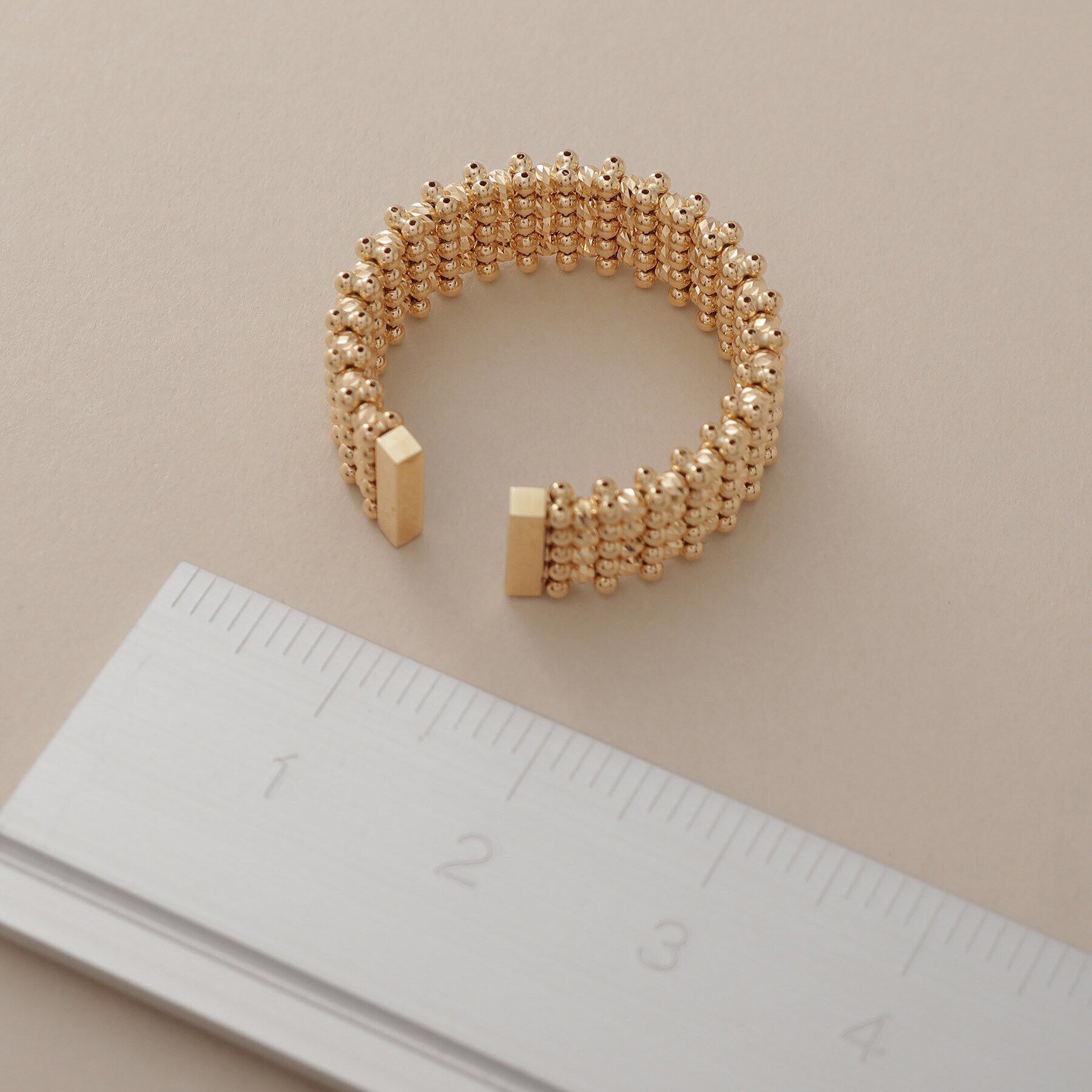 COCOSHNIK「K18ハニーカットボールオープン リング太」|リング|