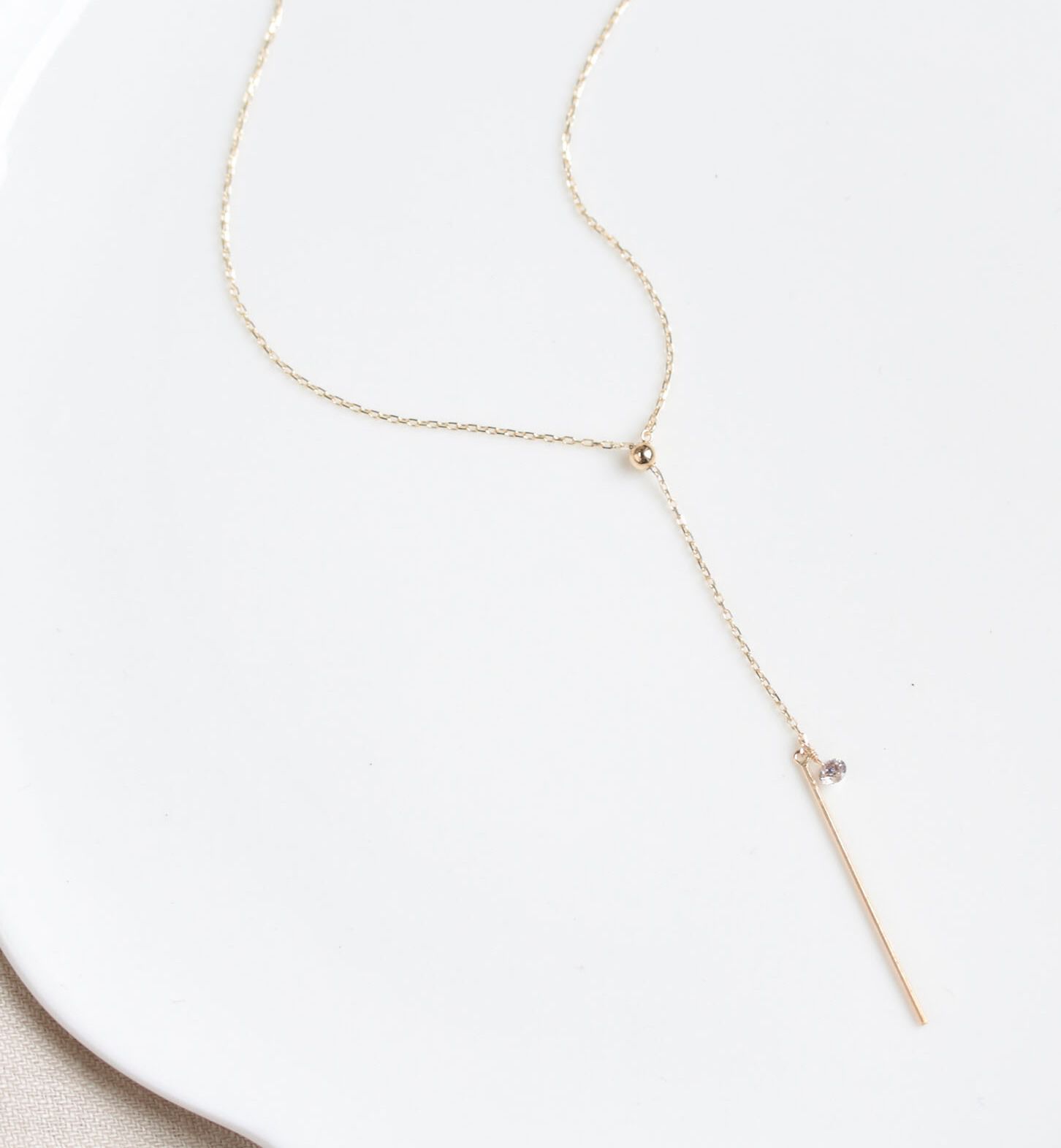  「シャンパンダイヤモンド 0.1ct ムーブチェーン ネックレス | K10YG 〈ヌーディー〉」|ネックレス|