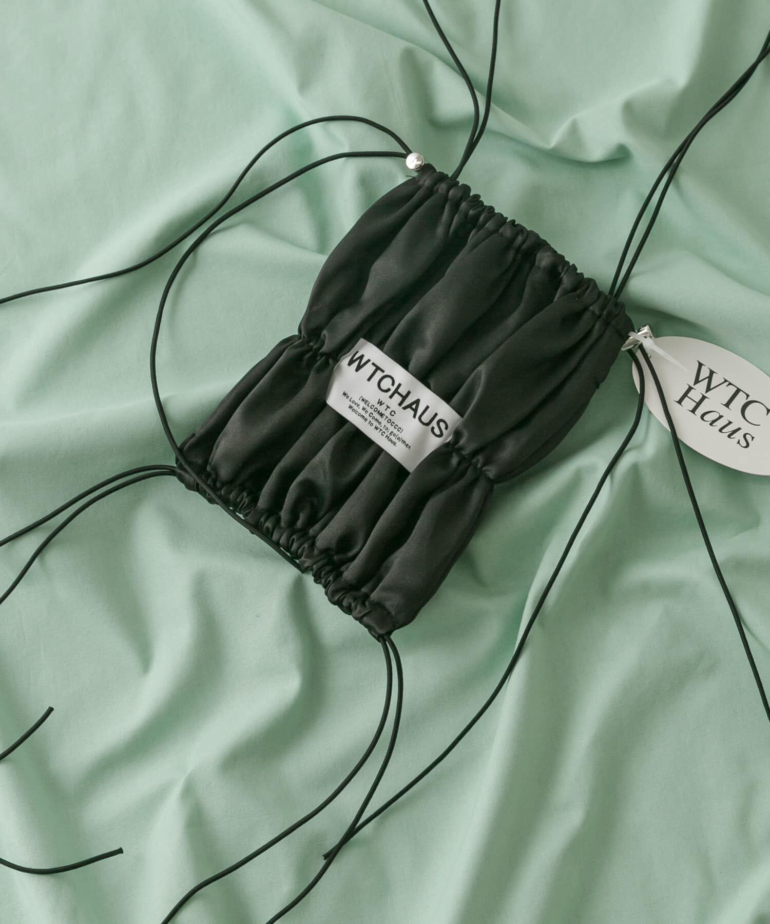 SMELLY「『WEB/一部店舗限定』WELCOMETOCCC　ppipi bag」|ショルダー・メッセンジャー|ブラック