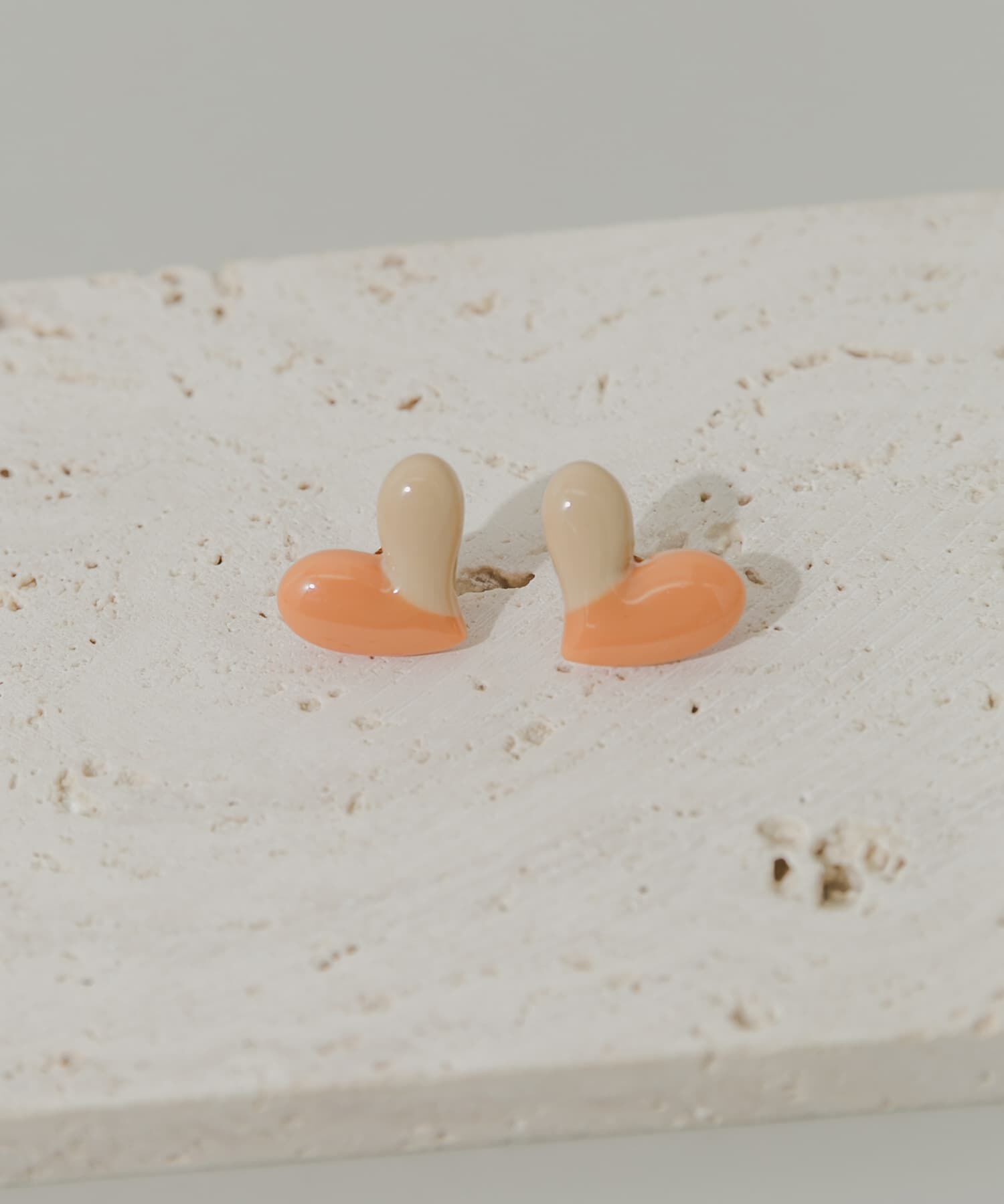 SMELLY「バイカラージュシハートピアス」|ピアス|