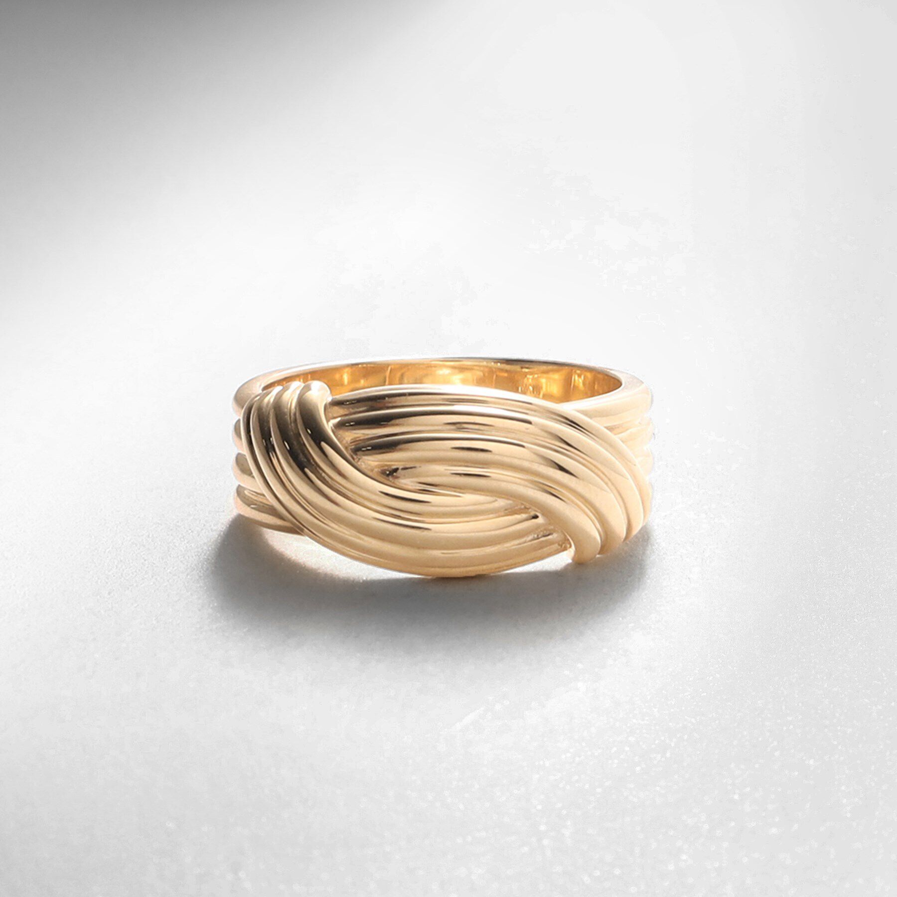 COCOSHNIK「K10ストライプパターンノット リング」|リング|