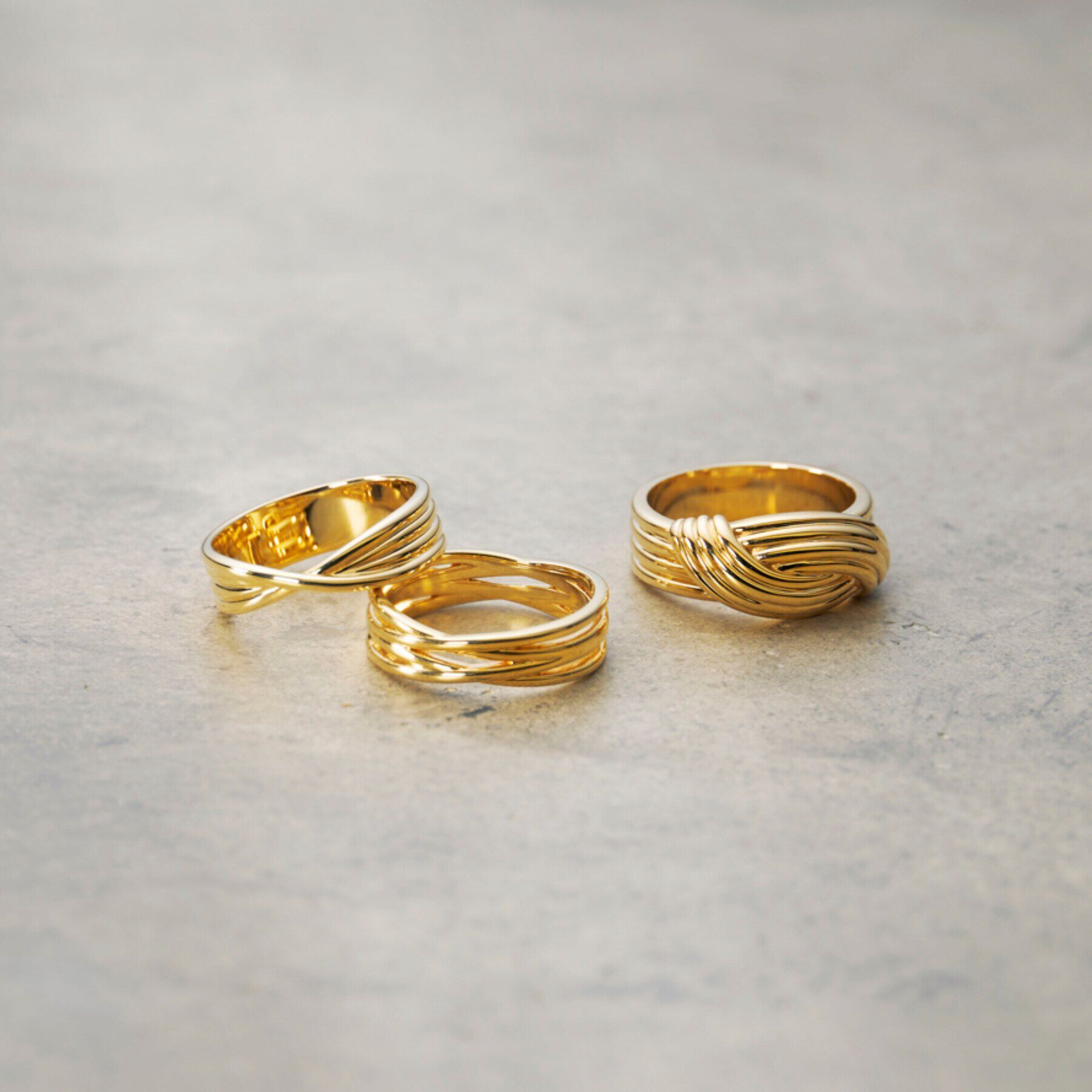 COCOSHNIK「K10ストライプパターンノット リング」|リング|