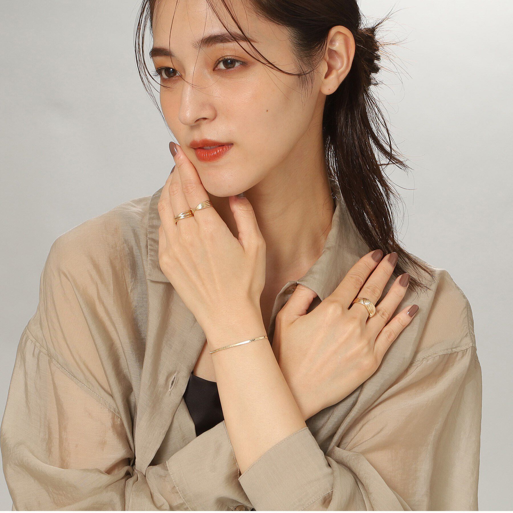 COCOSHNIK「K10ストライプパターンノット リング」|リング|