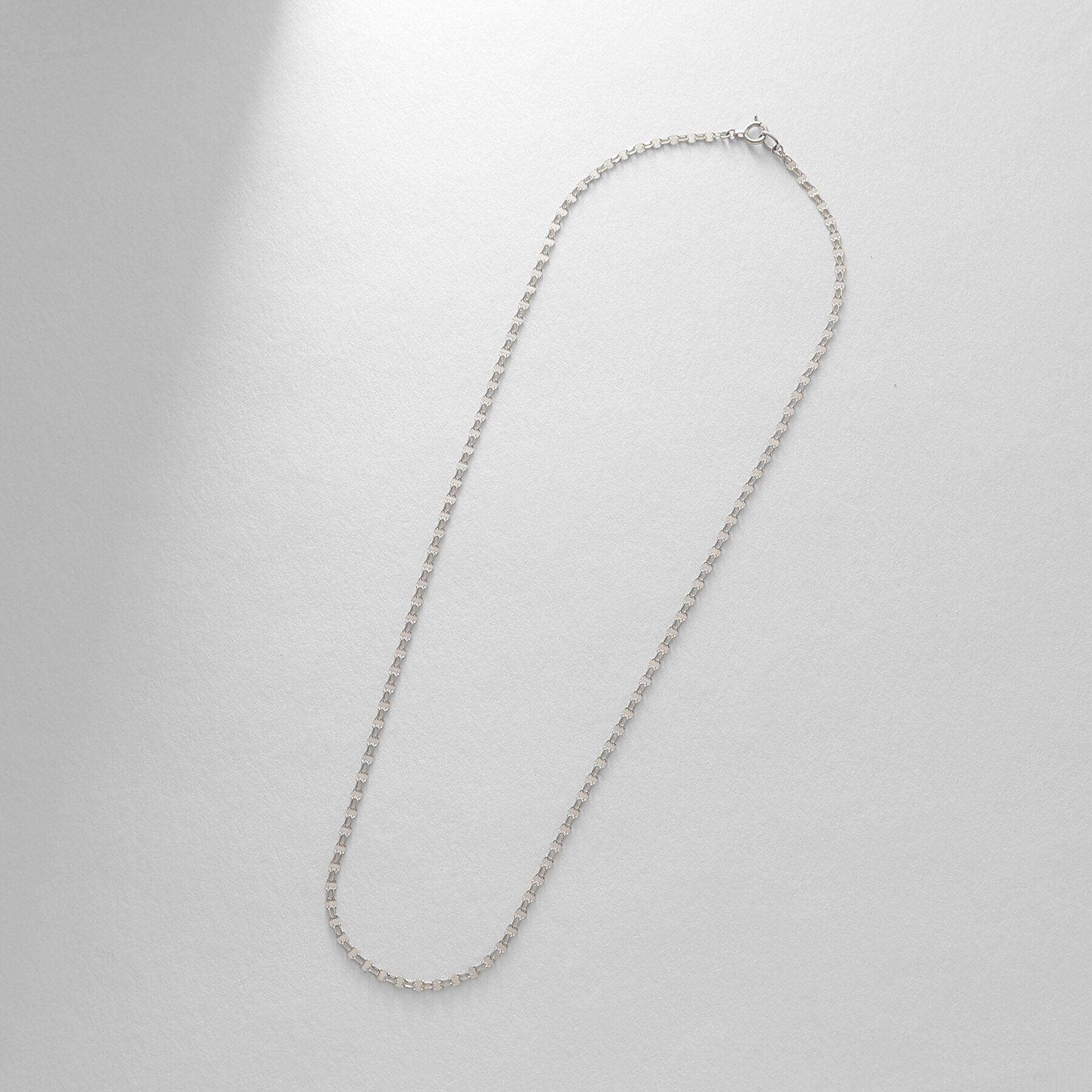 COCOSHNIK「プラチナ ダブルフラワークロス ネックレス」|ネックレス|