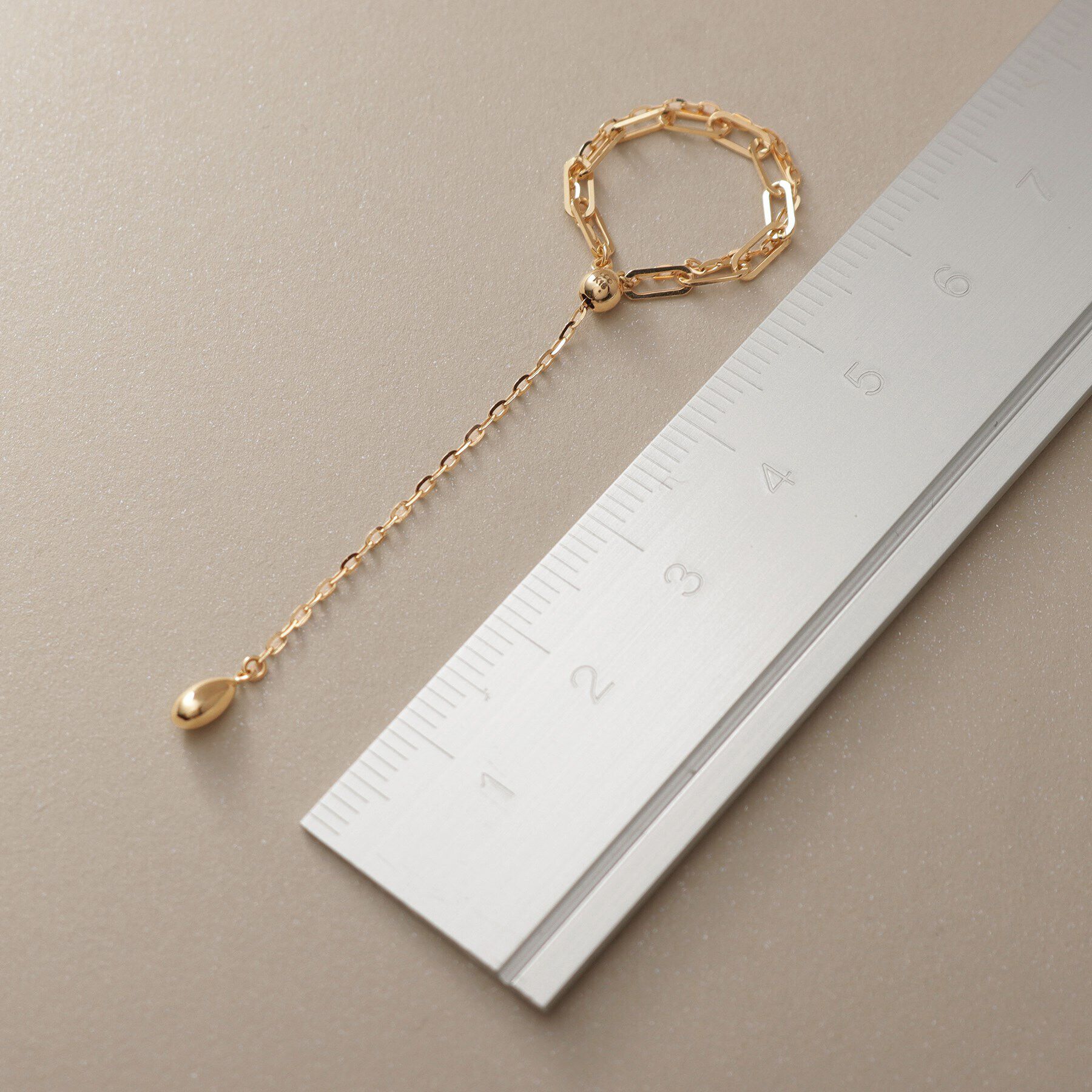 COCOSHNIK「K18ケーブルスライドチェーン リング」|リング|