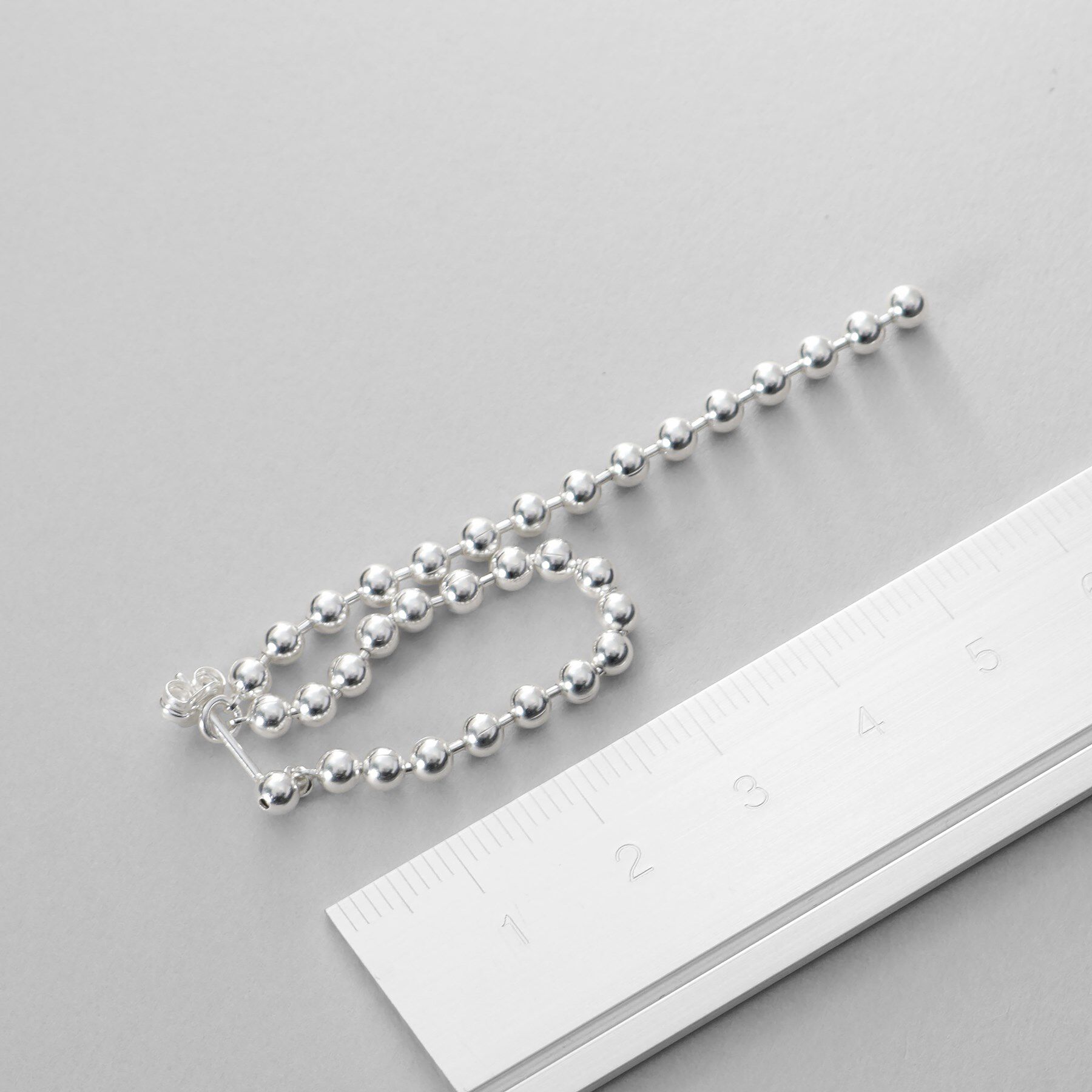 COCOSHNIK ONKITSCH「シルバー チェーンピアス ボールループ」|ピアス|