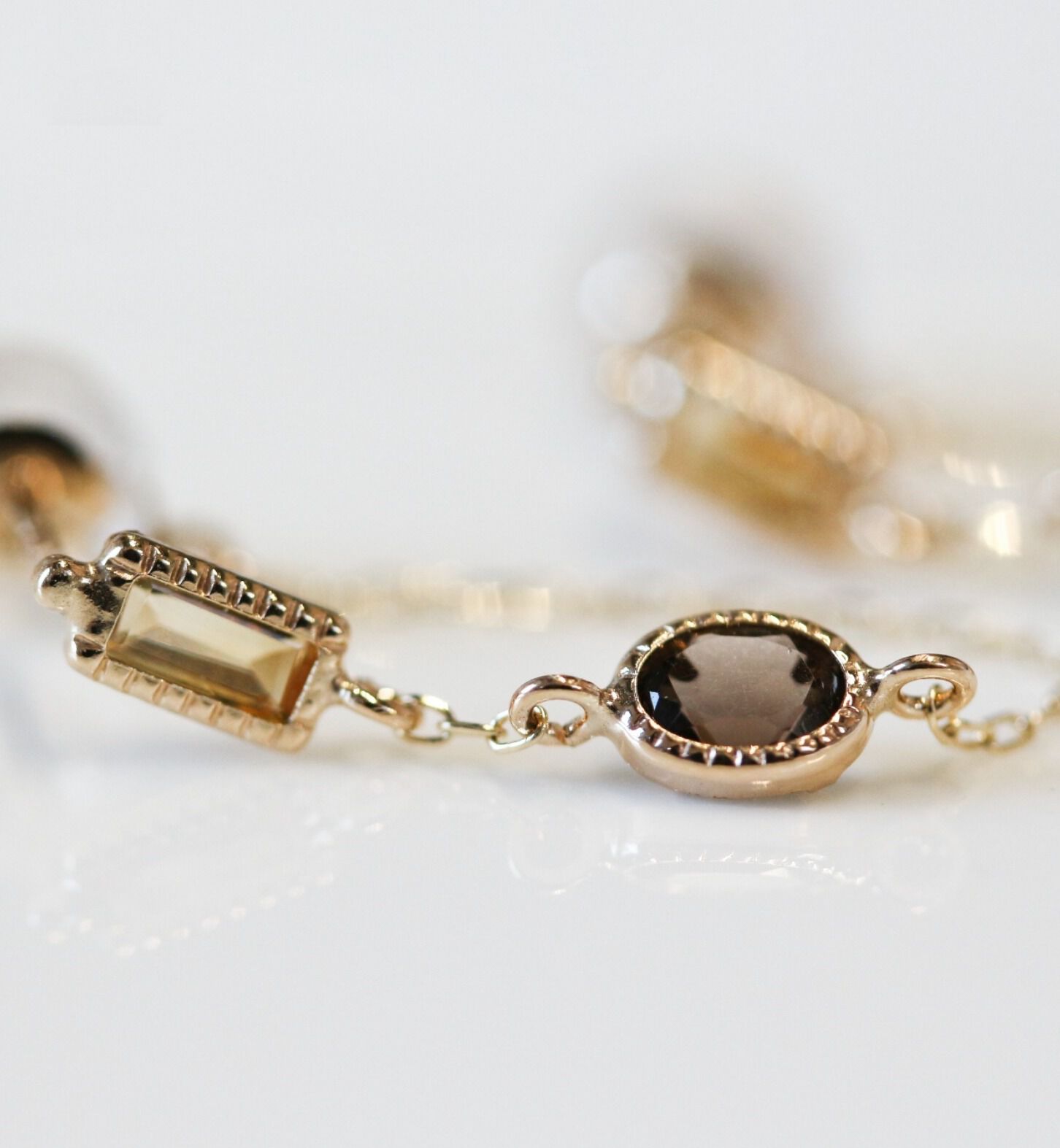  「シトリン / スモーキークォーツ チェーンフープ ピアス | K10YG」|ピアス|