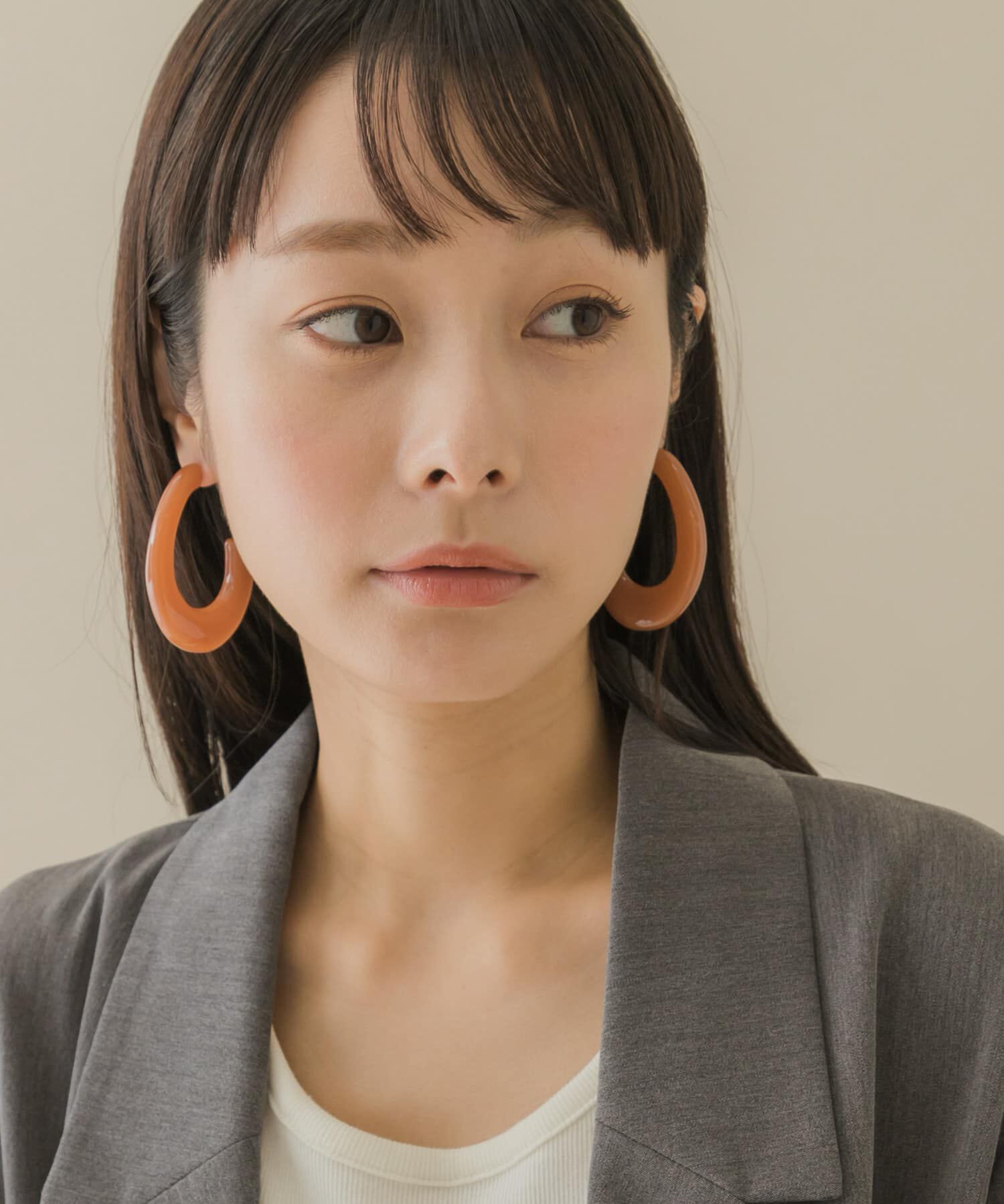 SMELLY「カラーオーバルボリュームピアス」|ピアス|ブラウン