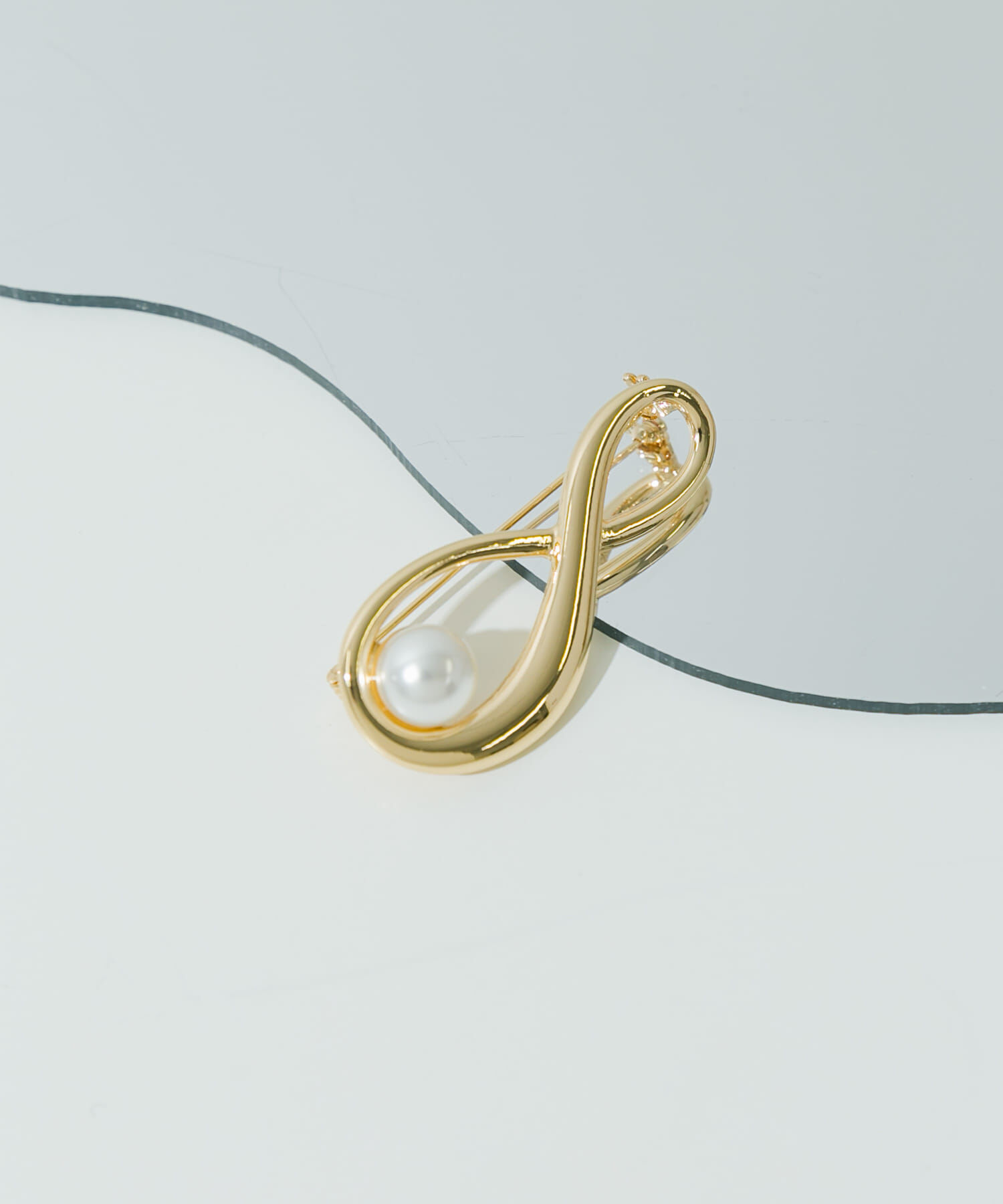 SMELLY「パールツイストブローチ」|ブローチ・コサージュ|