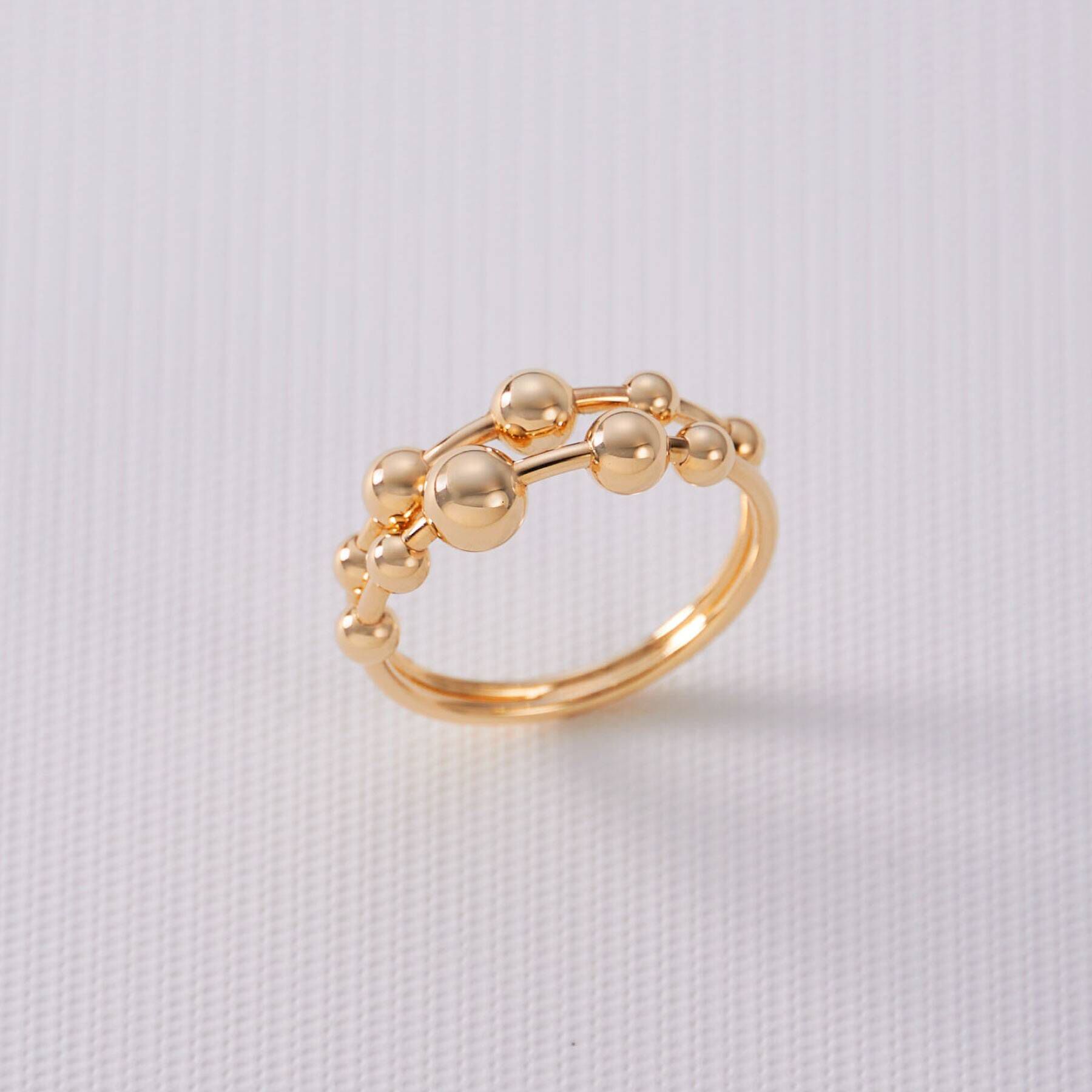 COCOSHNIK「K10中空ボールランダム2連 リング」|リング|