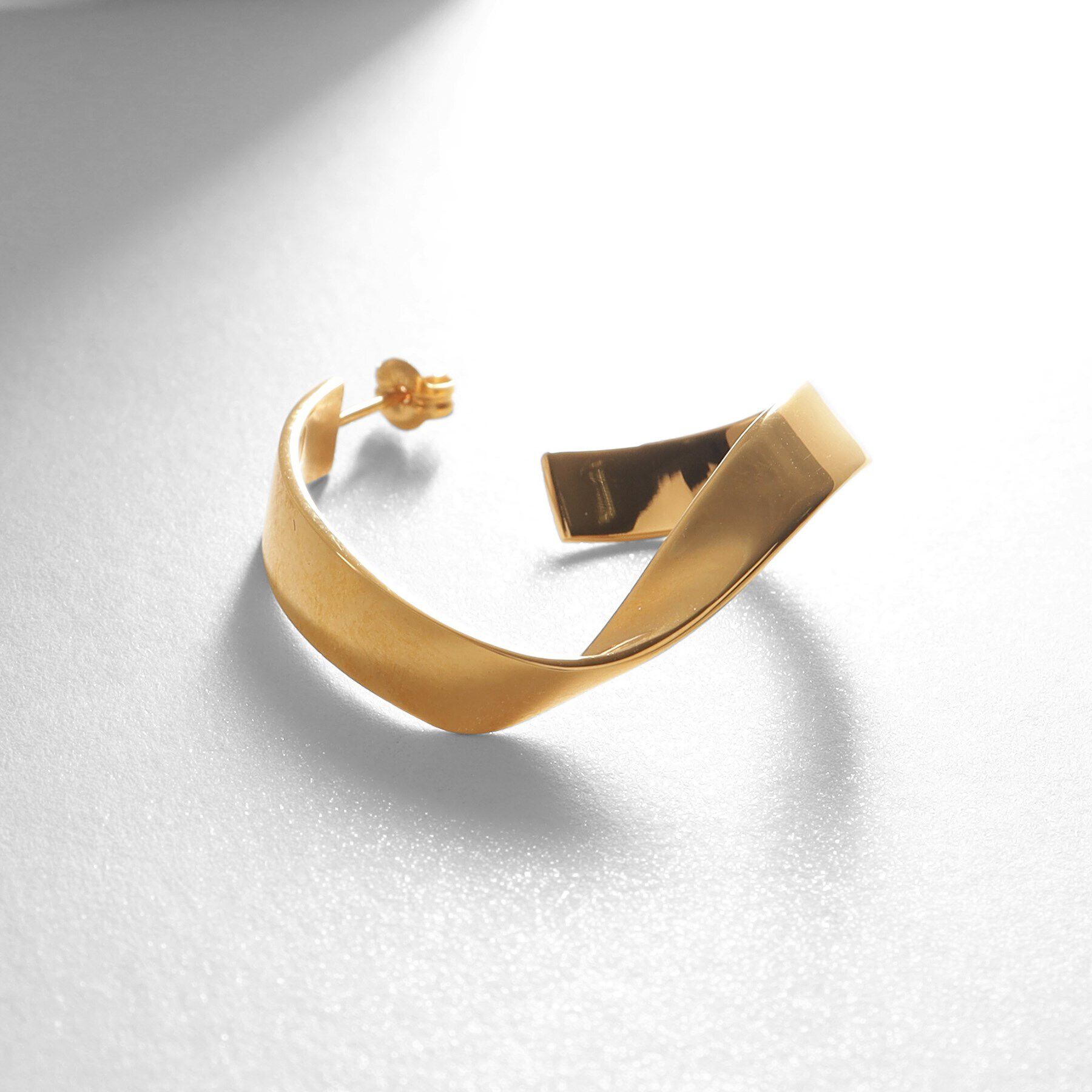 COCOSHNIK ONKITSCH「シルバー フォールディングピアス ストリーム GP」|ピアス|