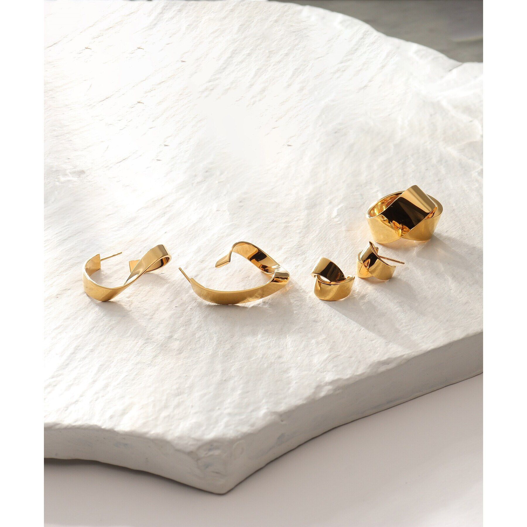 COCOSHNIK ONKITSCH「シルバー フォールディングピアス ストリーム GP」|ピアス|