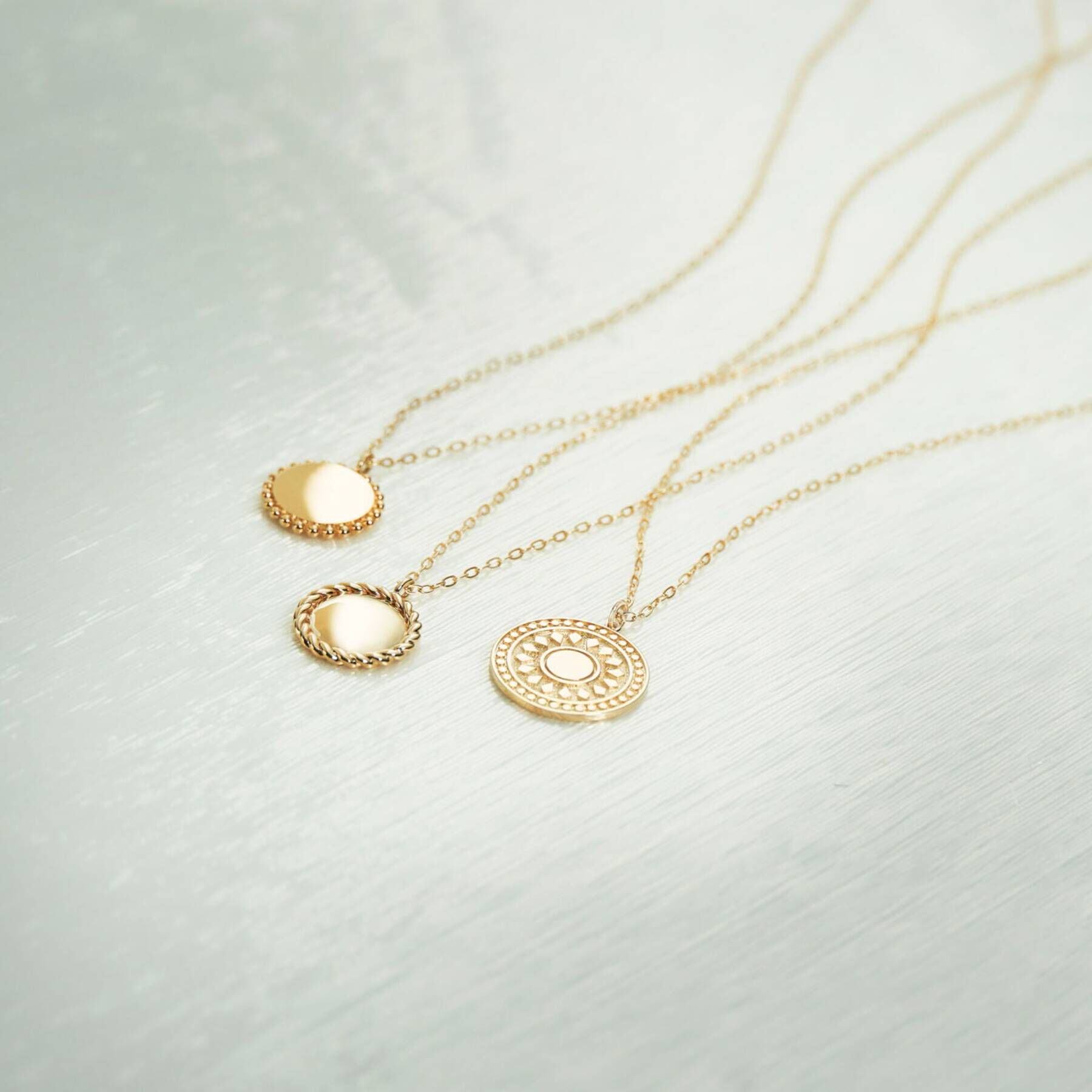 COCOSHNIK「K10コインモチーフ 縄目 ネックレス」|ネックレス|