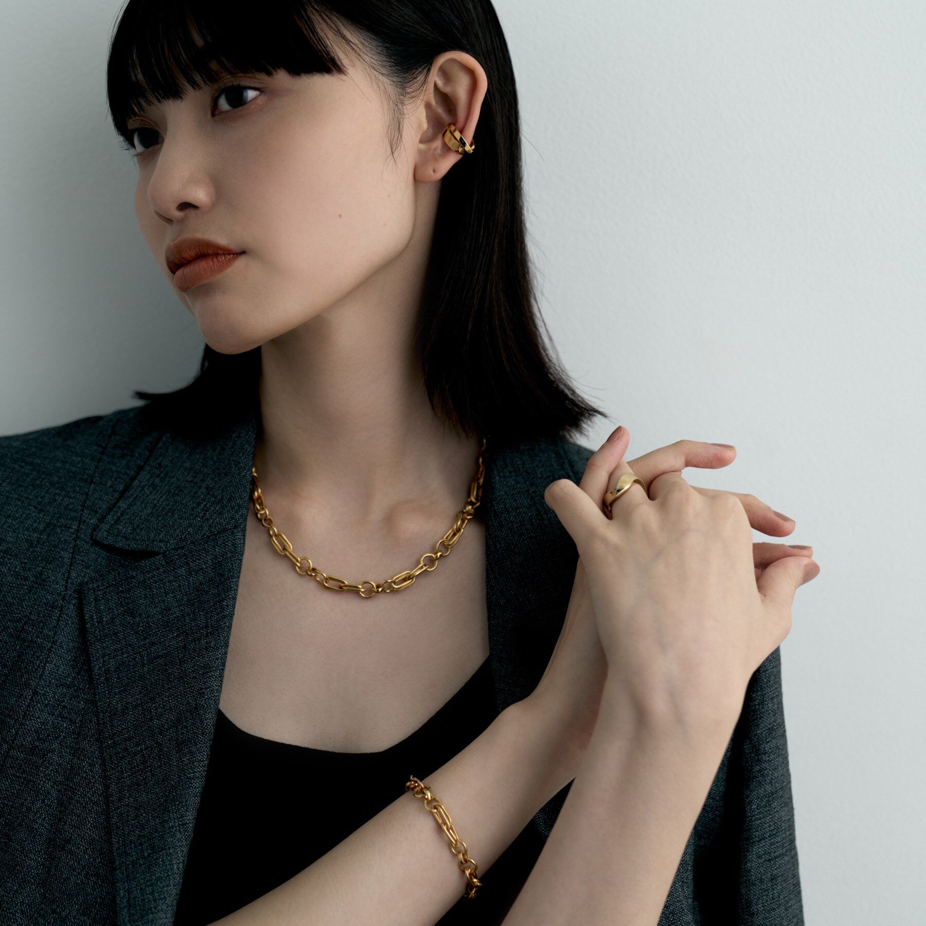 COCOSHNIK ONKITSCH「シルバー フラットオーバルクロスイヤカフ GP」|イヤリング|