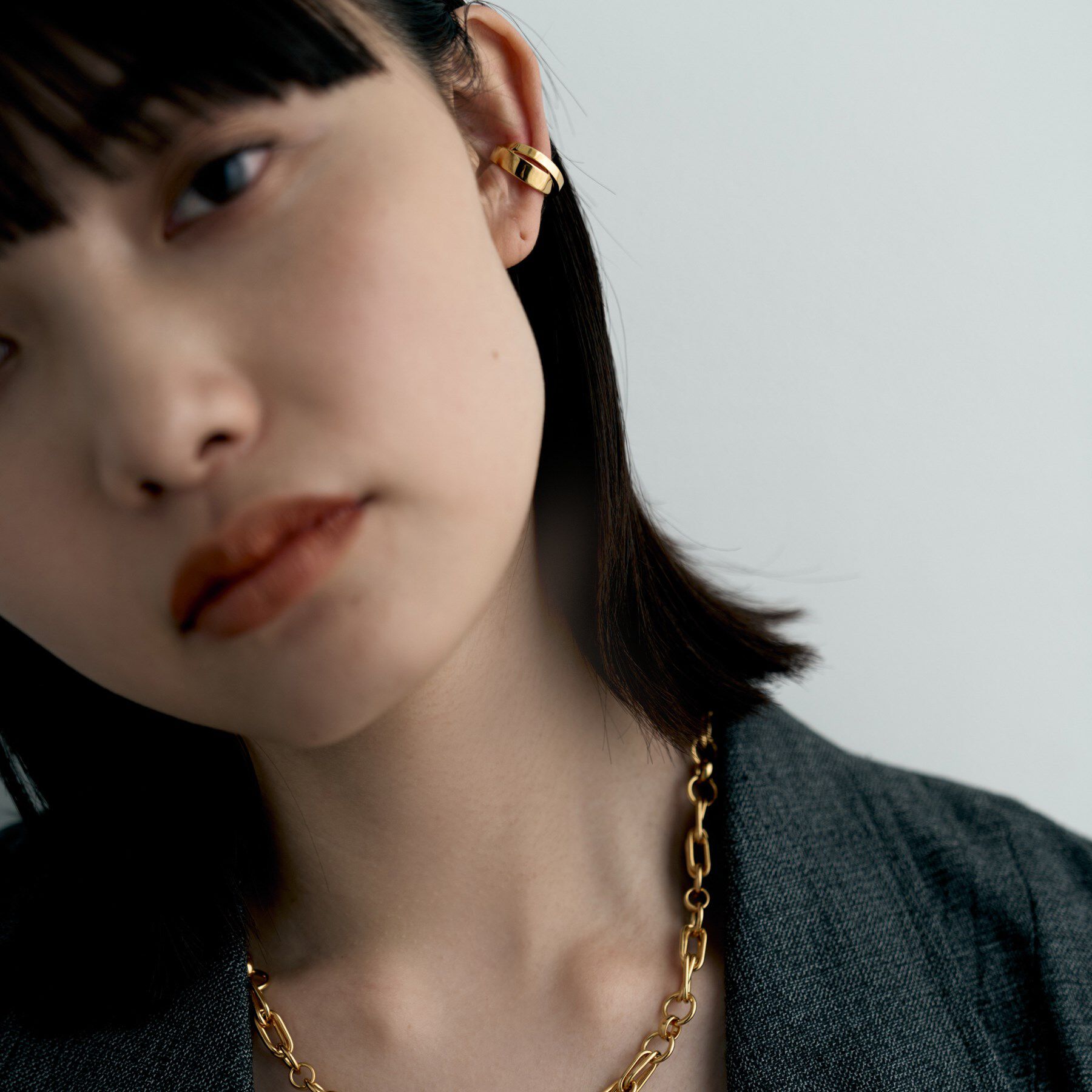 COCOSHNIK ONKITSCH「シルバー フラットオーバルクロスイヤカフ GP」|イヤリング|