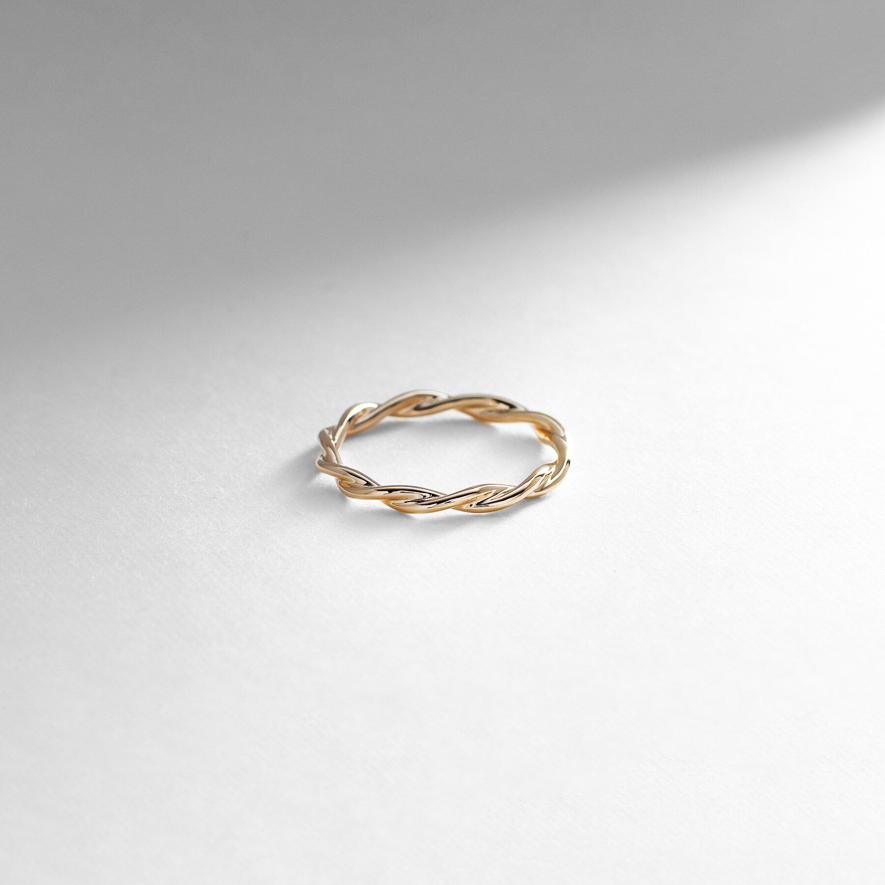 COCOSHNIK「K10丸線ねじり リング（16号）」|リング|