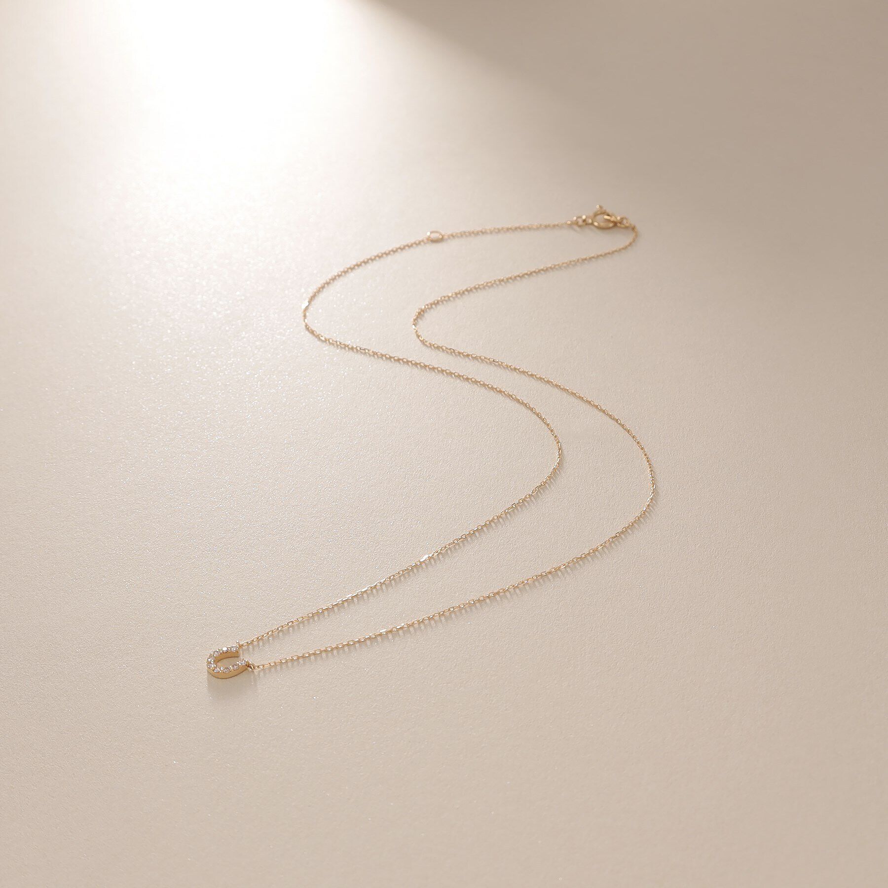 COCOSHNIK「K18ダイヤモンド 馬蹄モチーフ ネックレス」|ネックレス|イエローゴールド(1