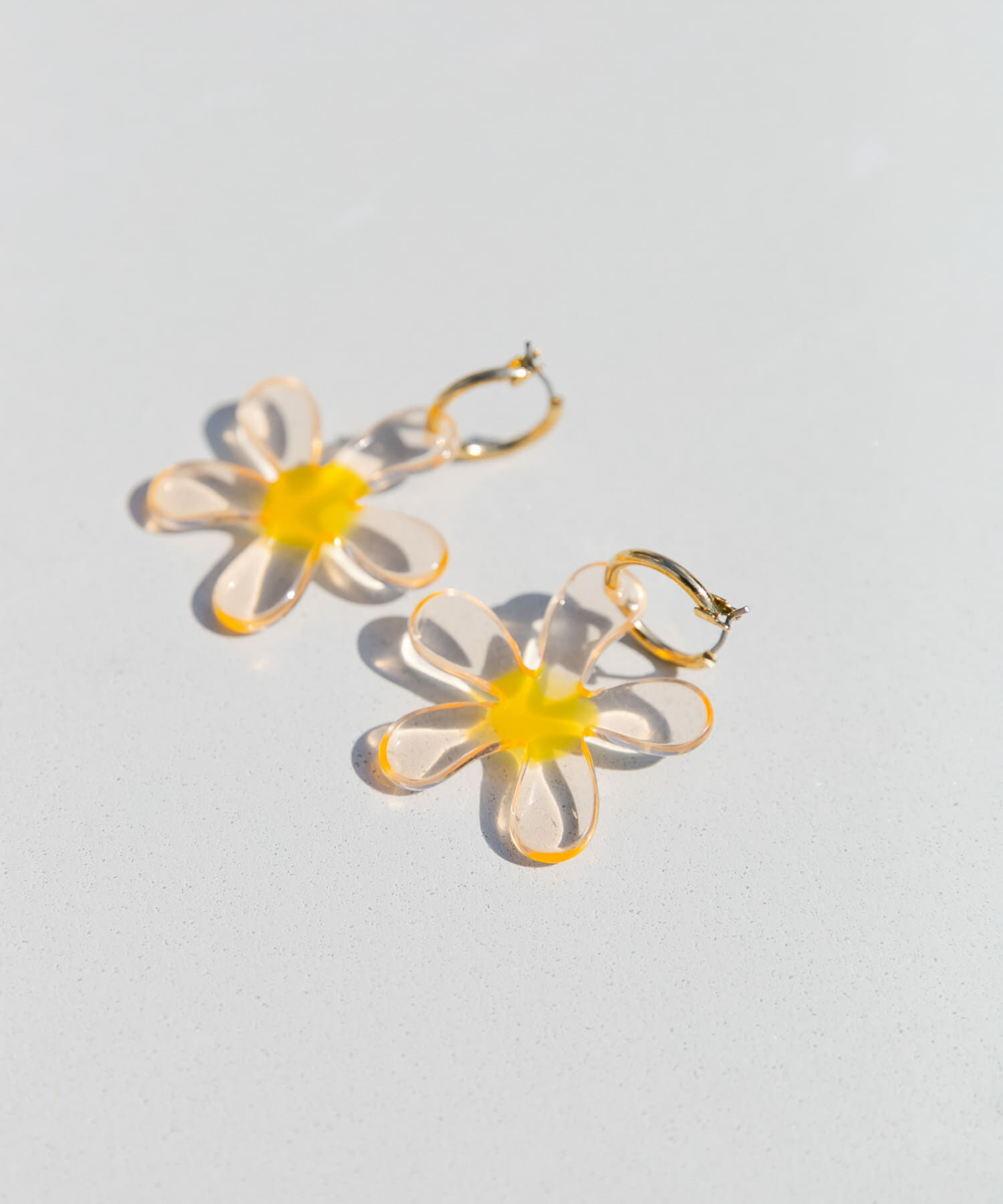 SMELLY「クリアフラワーメタルフープピアス」|ピアス|