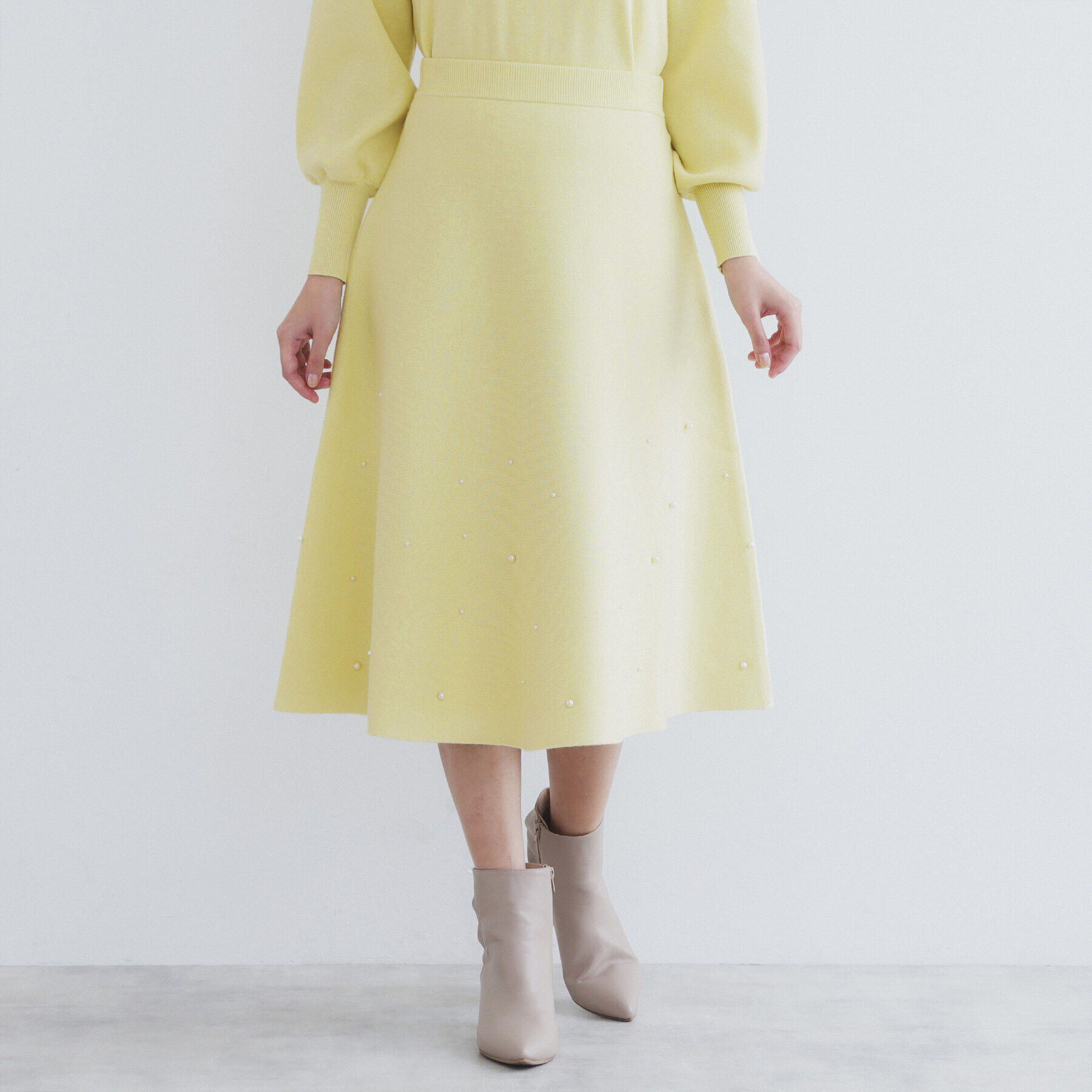 index「《美人百花掲載》パール調フレアニットスカート/セットアップ対応【洗濯機洗い可】」|スカート|