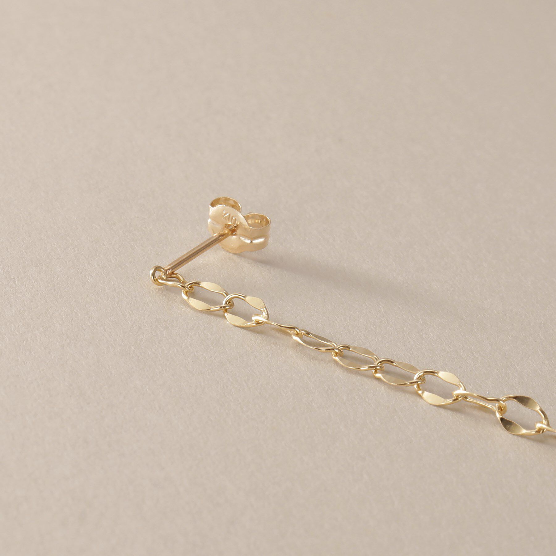 COCOSHNIK「K10シースルーフラット スタッドピアス」|ピアス|