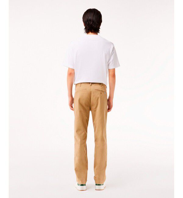 LACOSTE「オーガニックコットン ロゴピスネーム スリムフィットストレッチチノパンツ」|チノ|