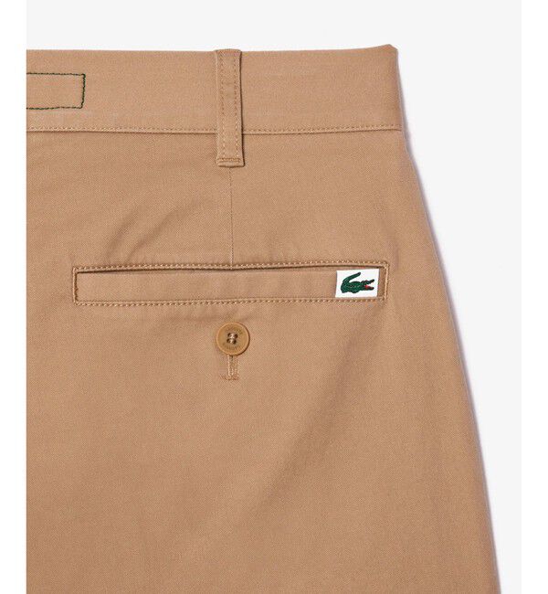 LACOSTE「オーガニックコットン ロゴピスネーム スリムフィットストレッチチノパンツ」|チノ|