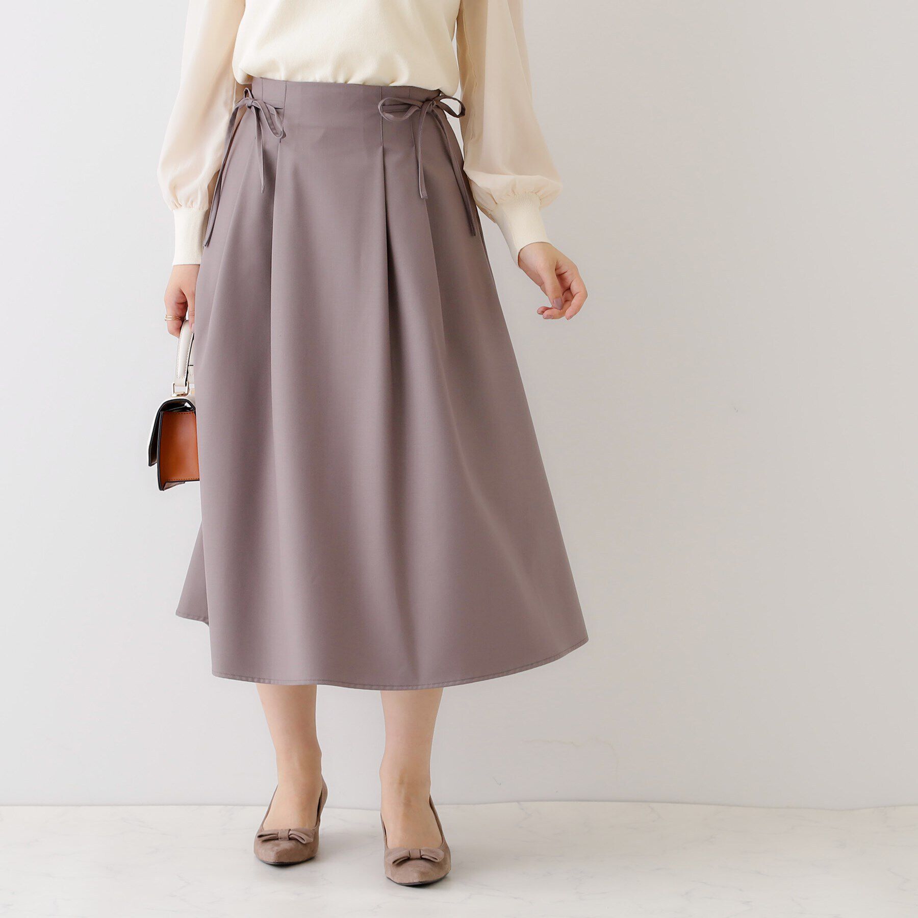 Couture broach「【キレイめコーデ・通勤にも】サイドリボンデザインフレアスカート」|スカート|