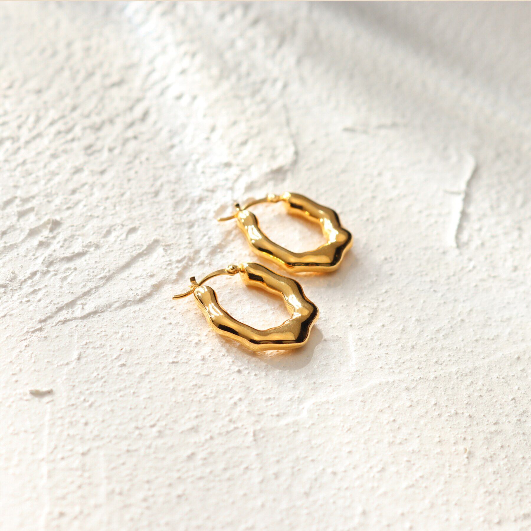 COCOSHNIK ONKITSCH「シルバー ニュアンスピアス オーバルフープ GP」|ピアス|