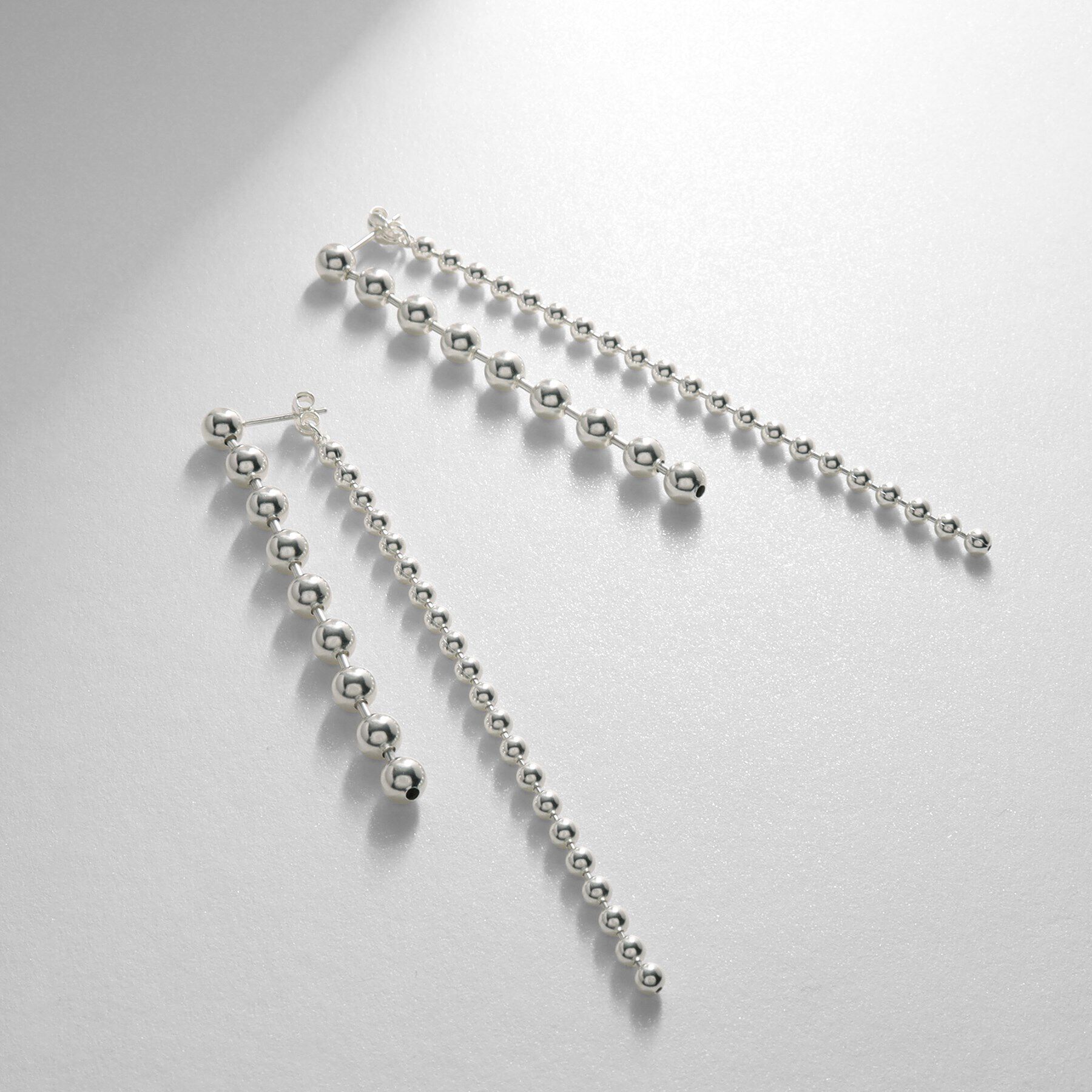 COCOSHNIK ONKITSCH「シルバー チェーンピアス ボール フロントバック」|ピアス|シルバー(600)